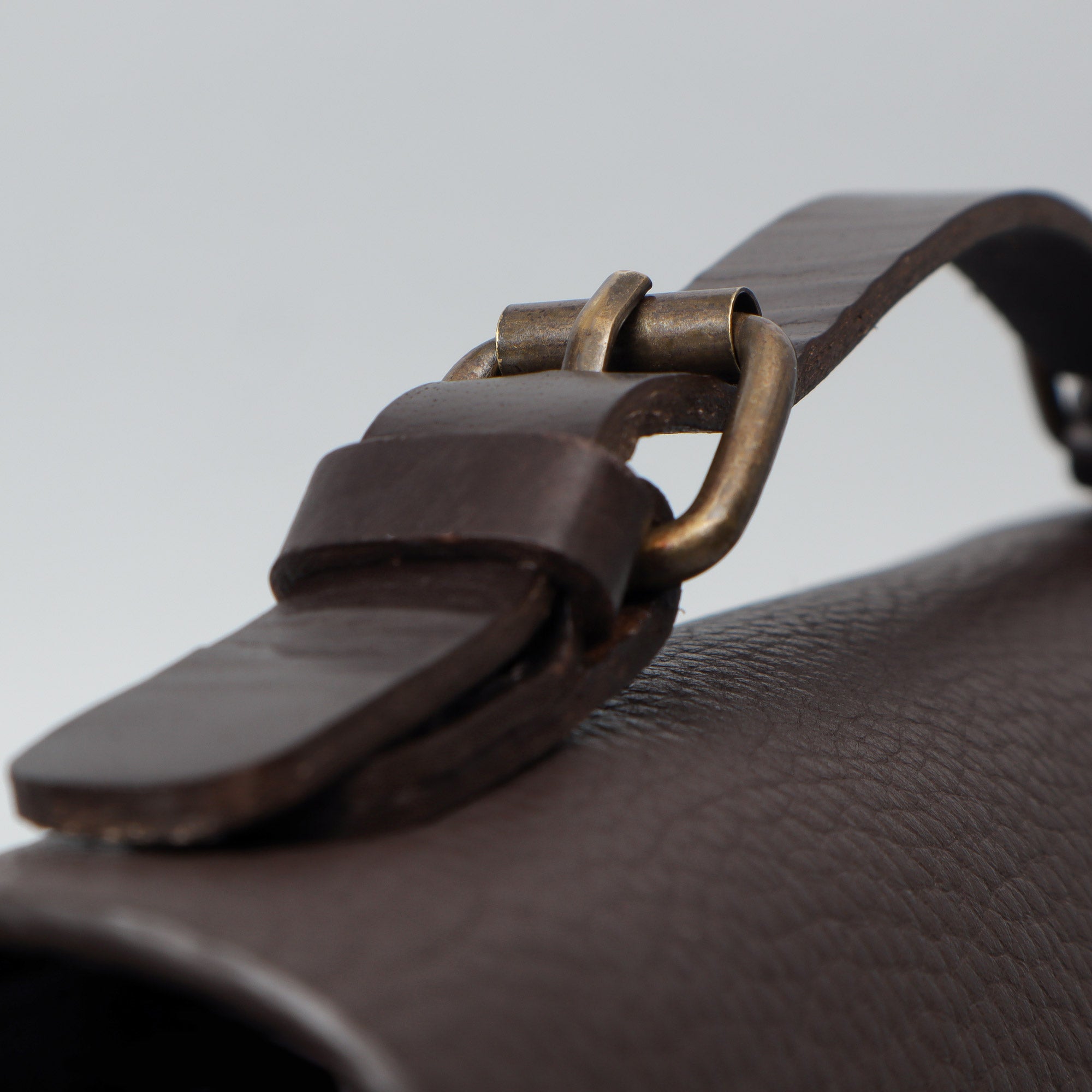 London Crossbody Bag made from premium full grain leather with vintage lock and multiple compartments.