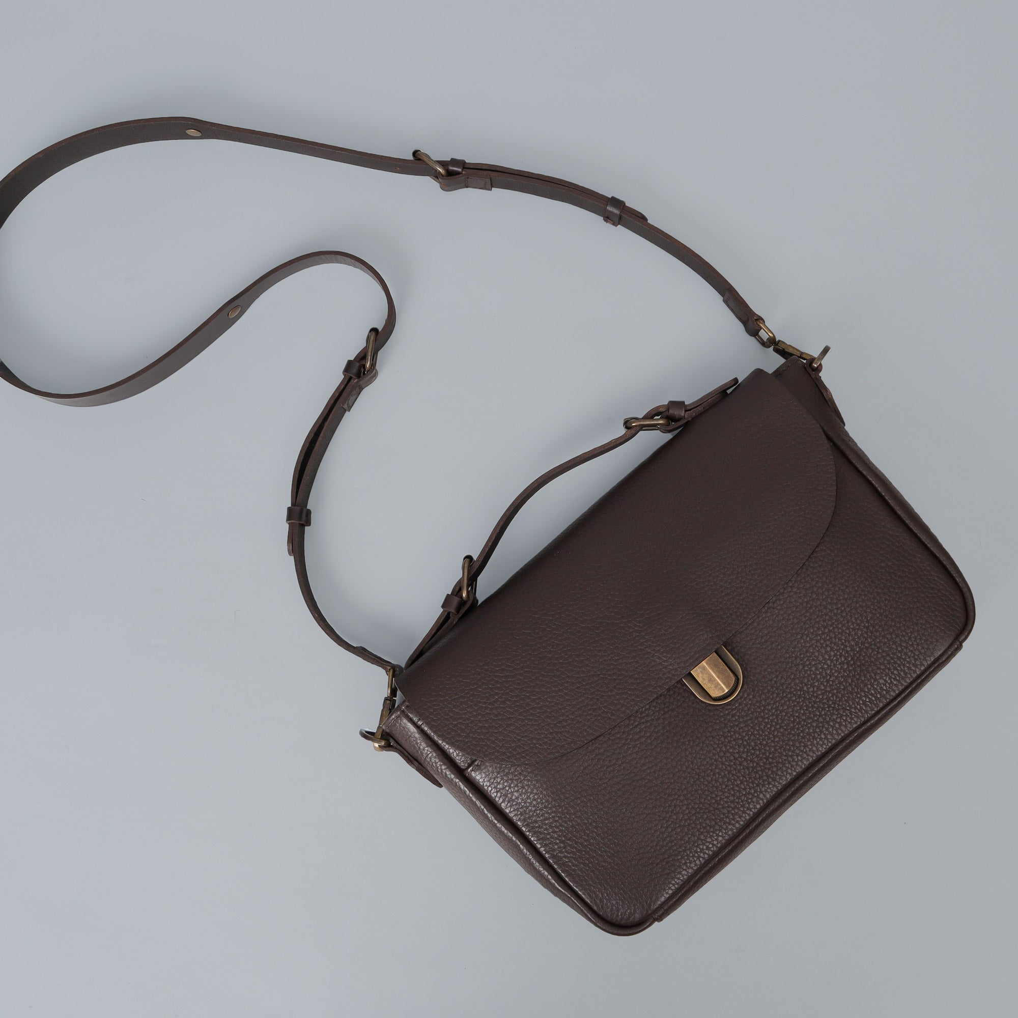 London Crossbody Bag made from premium full grain leather with vintage lock and multiple compartments.