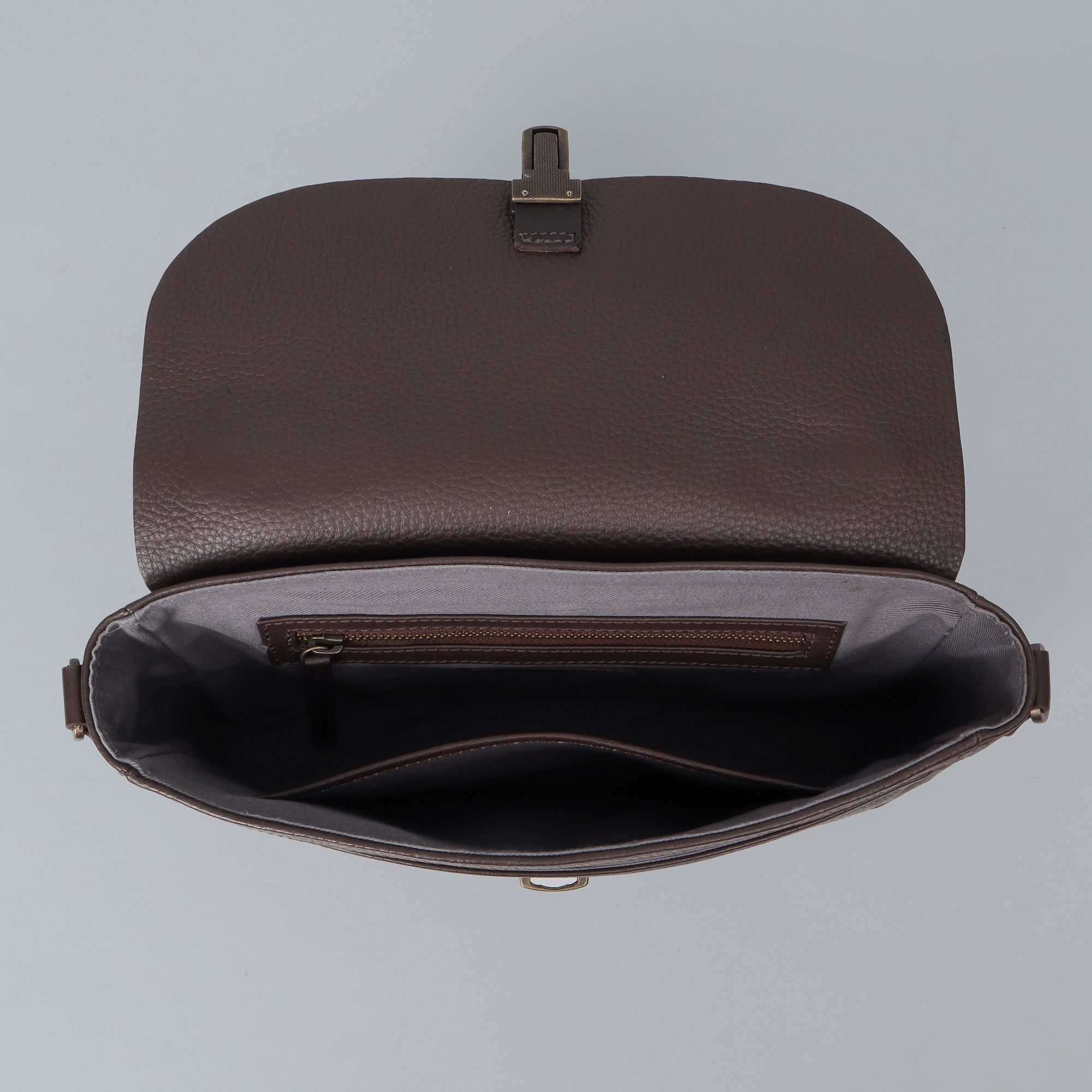 London Crossbody Bag made from premium full grain leather with vintage lock and multiple compartments.