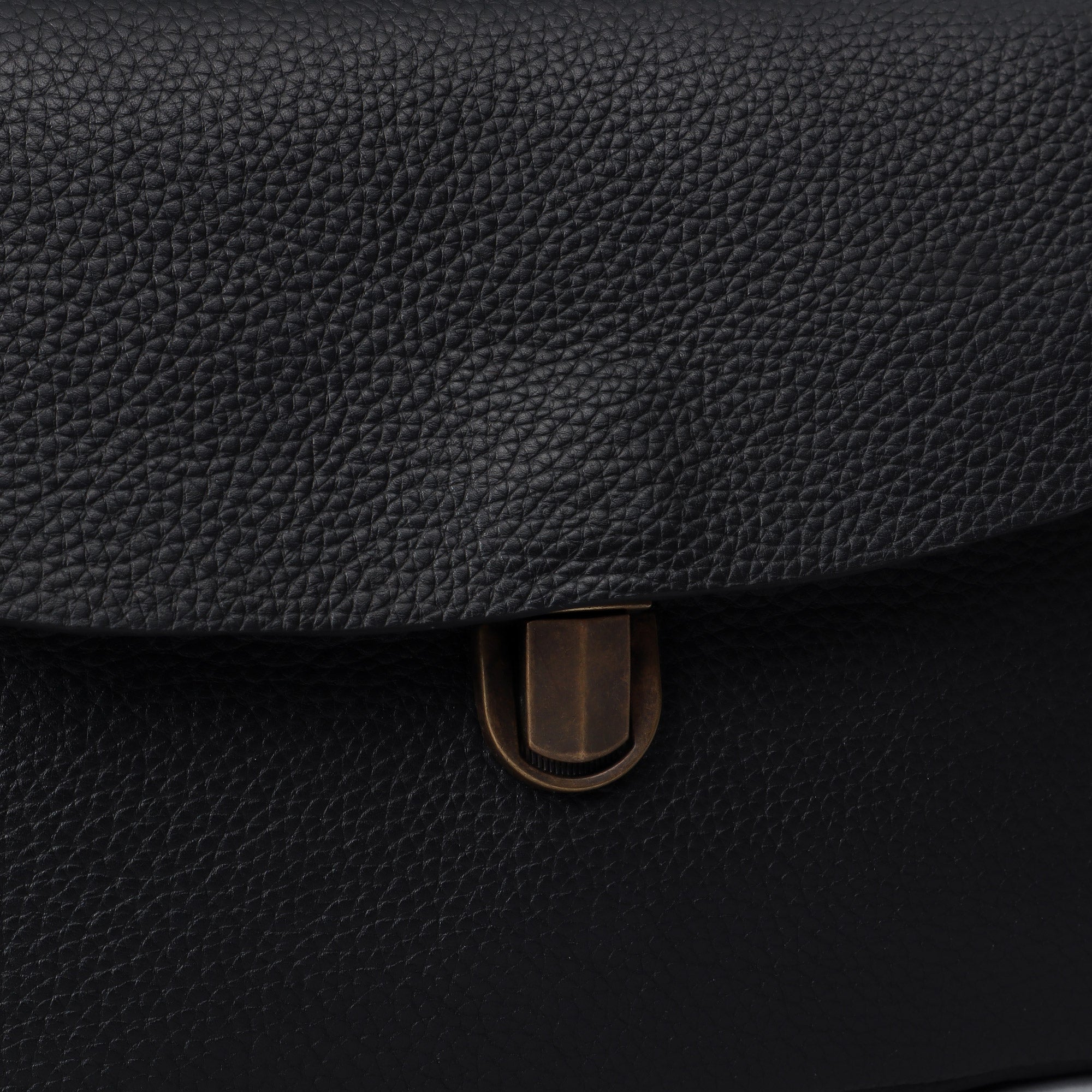 London Crossbody Bag made from premium full grain leather with vintage lock and multiple compartments.