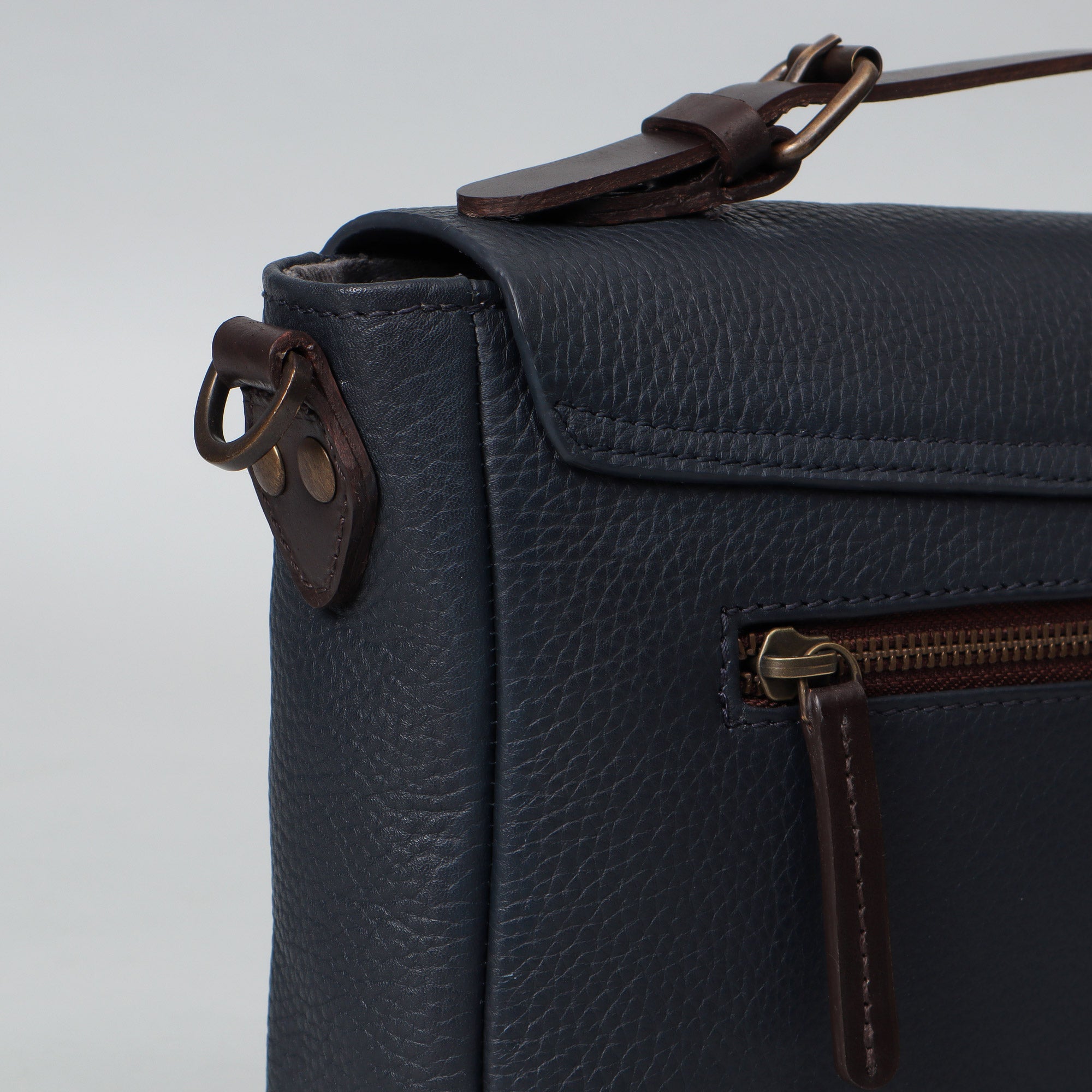 London Crossbody Bag made from premium full grain leather with vintage lock and multiple compartments.