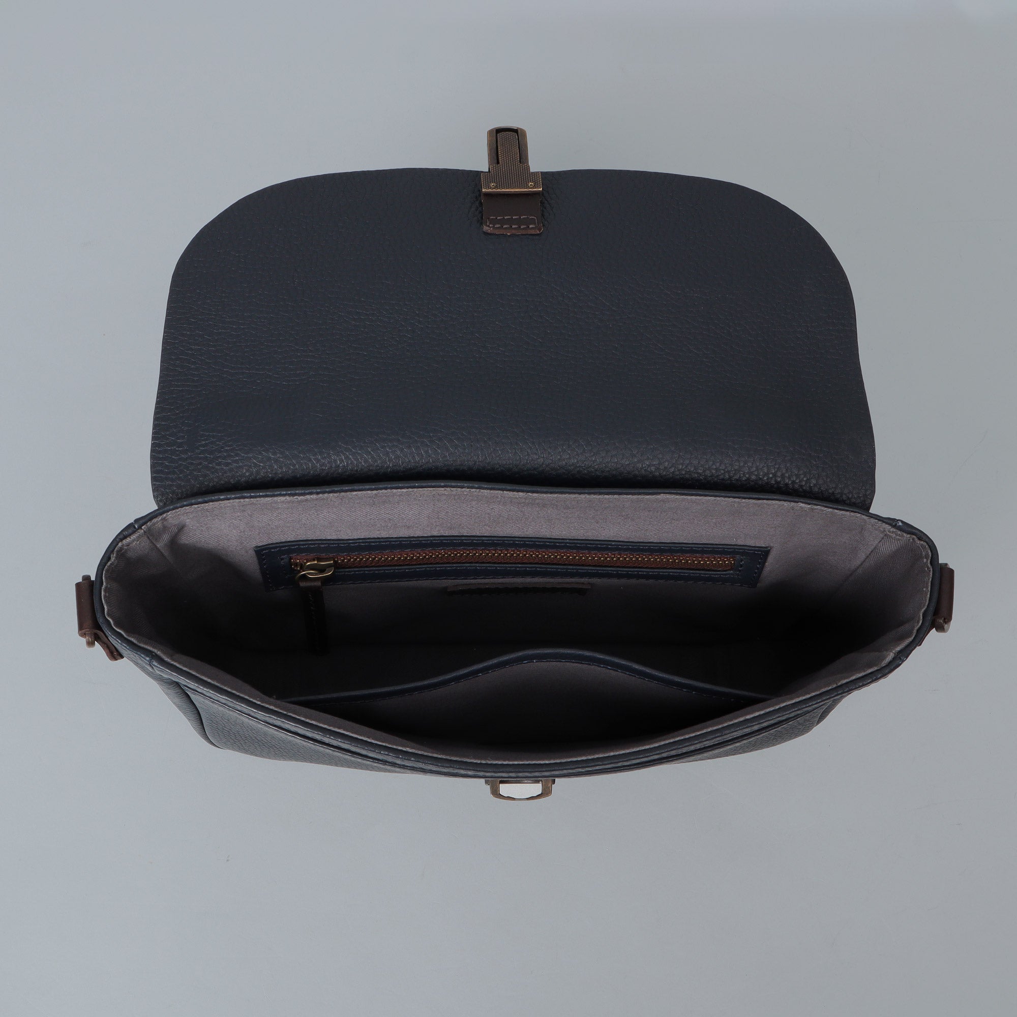 London Crossbody Bag made from premium full grain leather with vintage lock and multiple compartments.