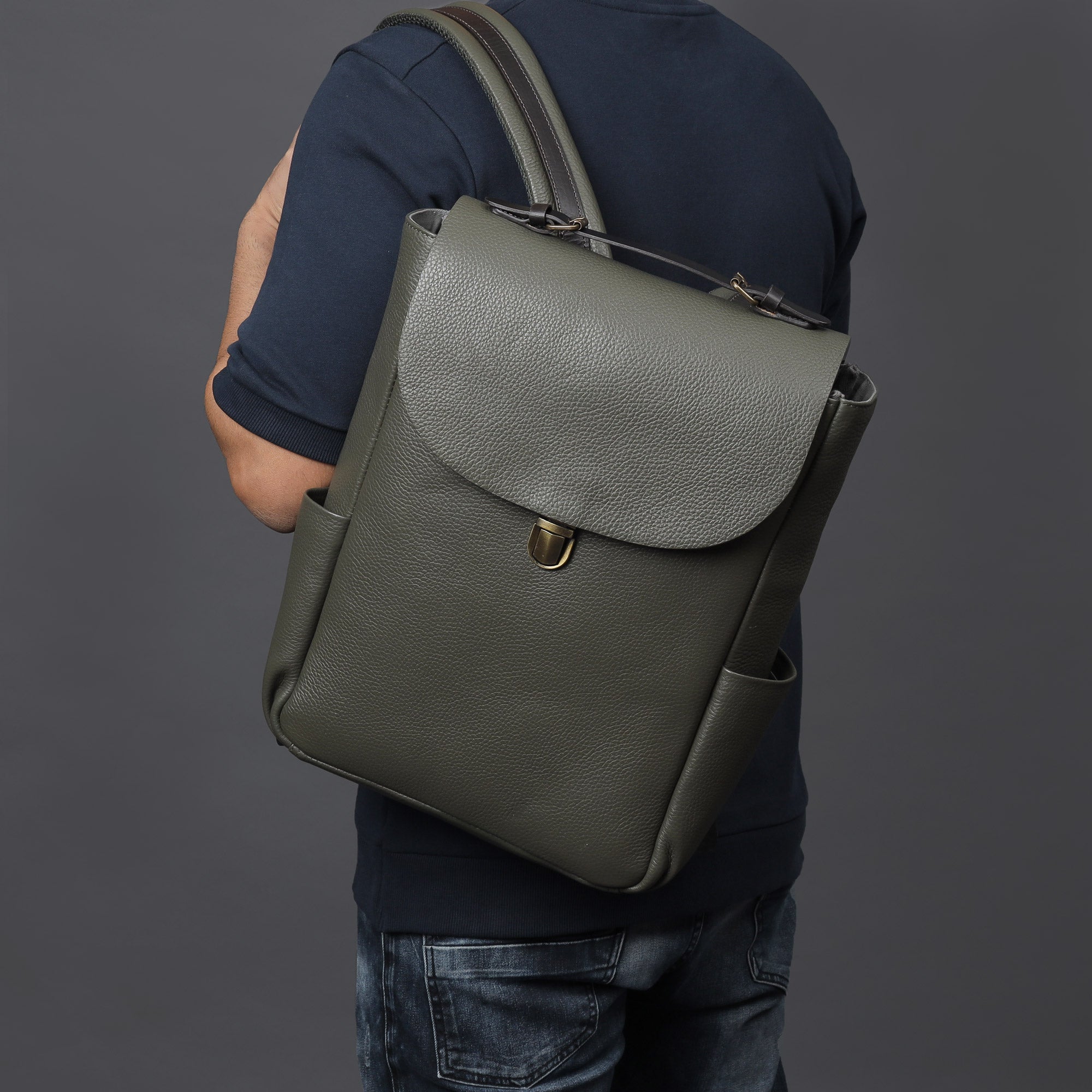 London Leather Backpack made from premium full grain leather with multiple pockets and adjustable straps.