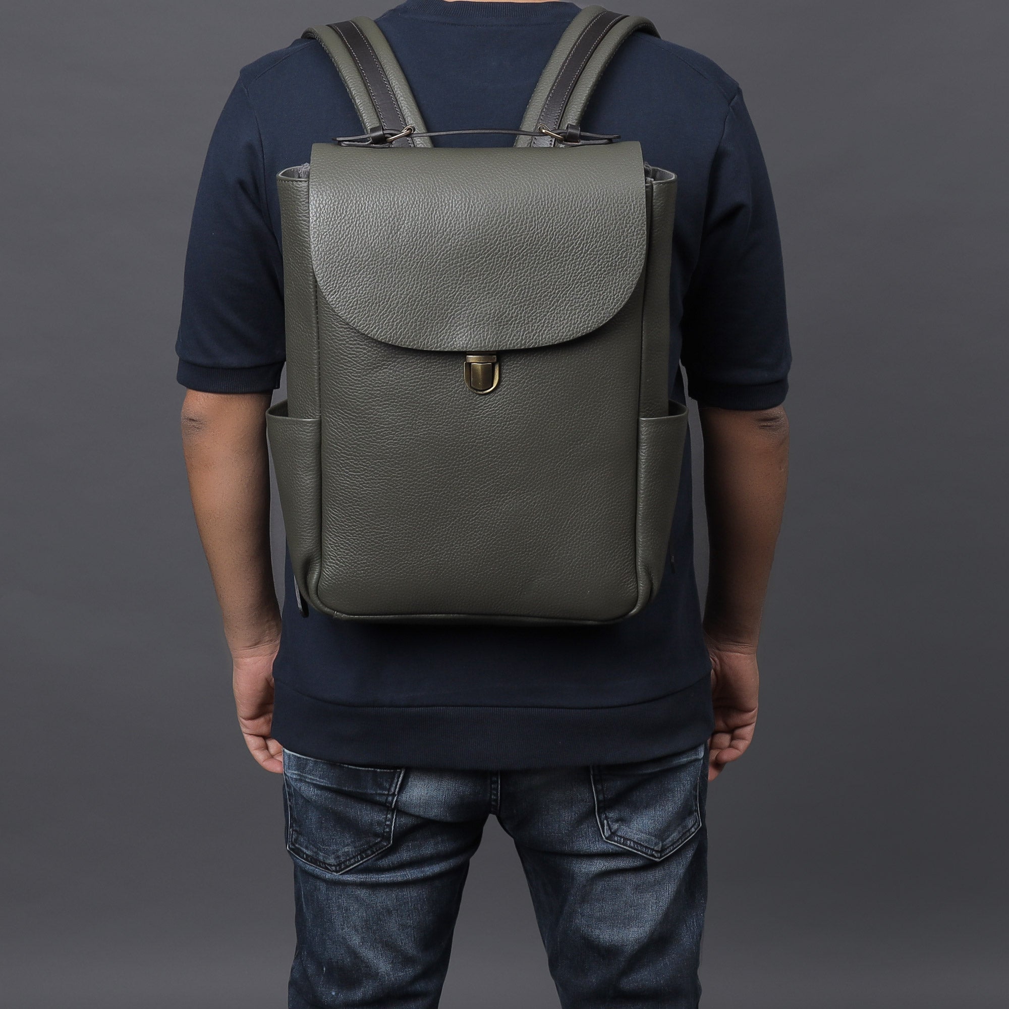 London Leather Backpack made from premium full grain leather with multiple pockets and adjustable straps.