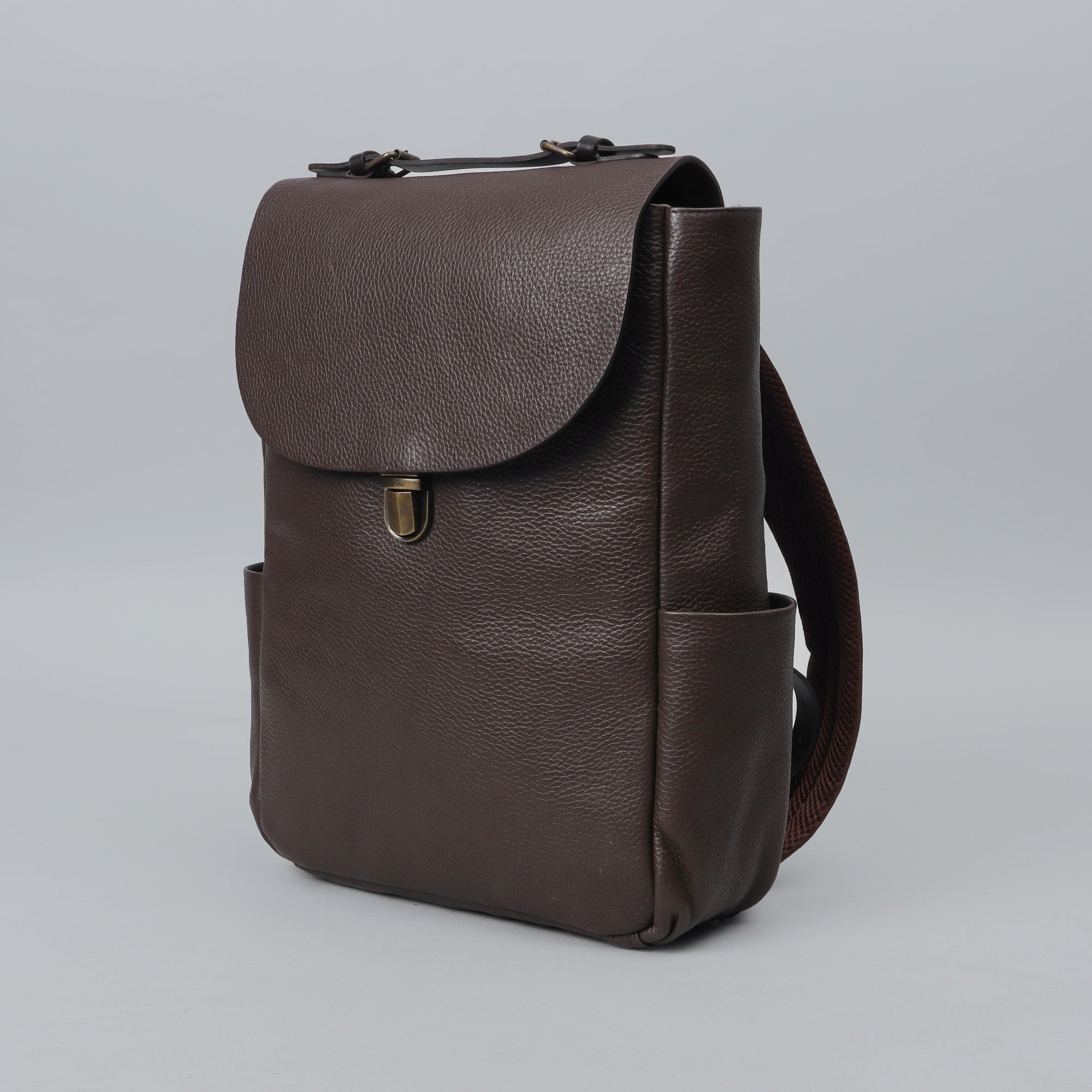 London Leather Backpack made from premium full grain leather with multiple pockets and adjustable straps, perfect for everyday use.