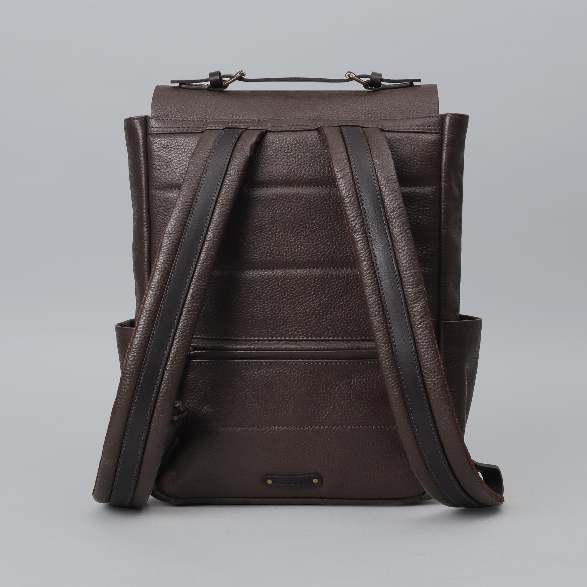 London Leather Backpack made from premium full grain leather with multiple pockets and adjustable straps, perfect for everyday use.