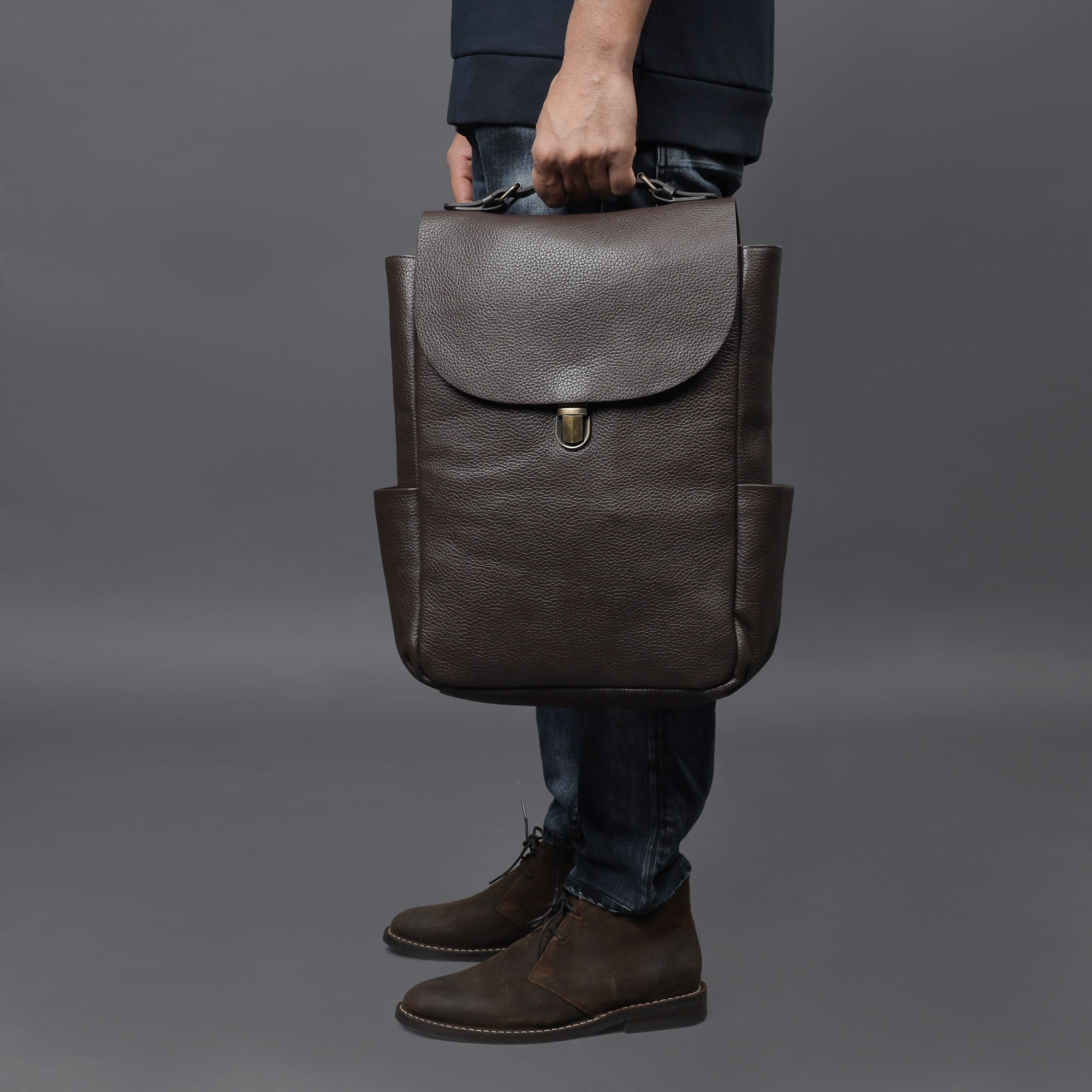 London Leather Backpack made from premium full grain leather with multiple pockets and adjustable straps, perfect for everyday use.