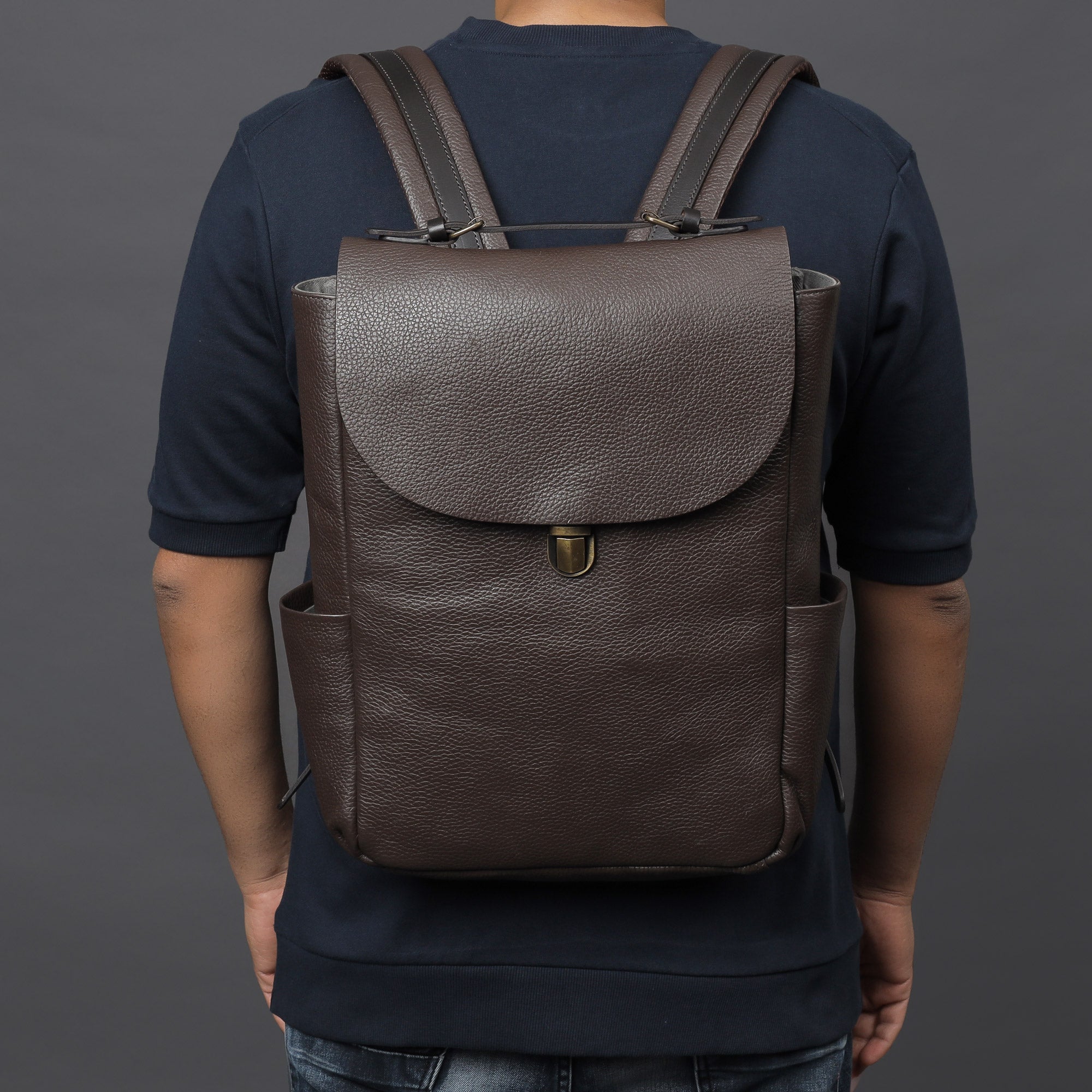 London Leather Backpack made from premium full grain leather with multiple pockets and adjustable straps, perfect for everyday use.