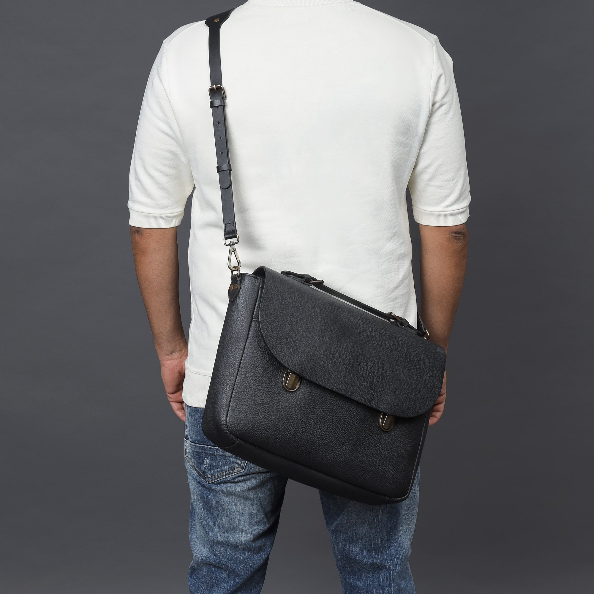 London Leather Briefcase showcasing premium full grain leather, spacious compartments, and a comfortable shoulder strap.