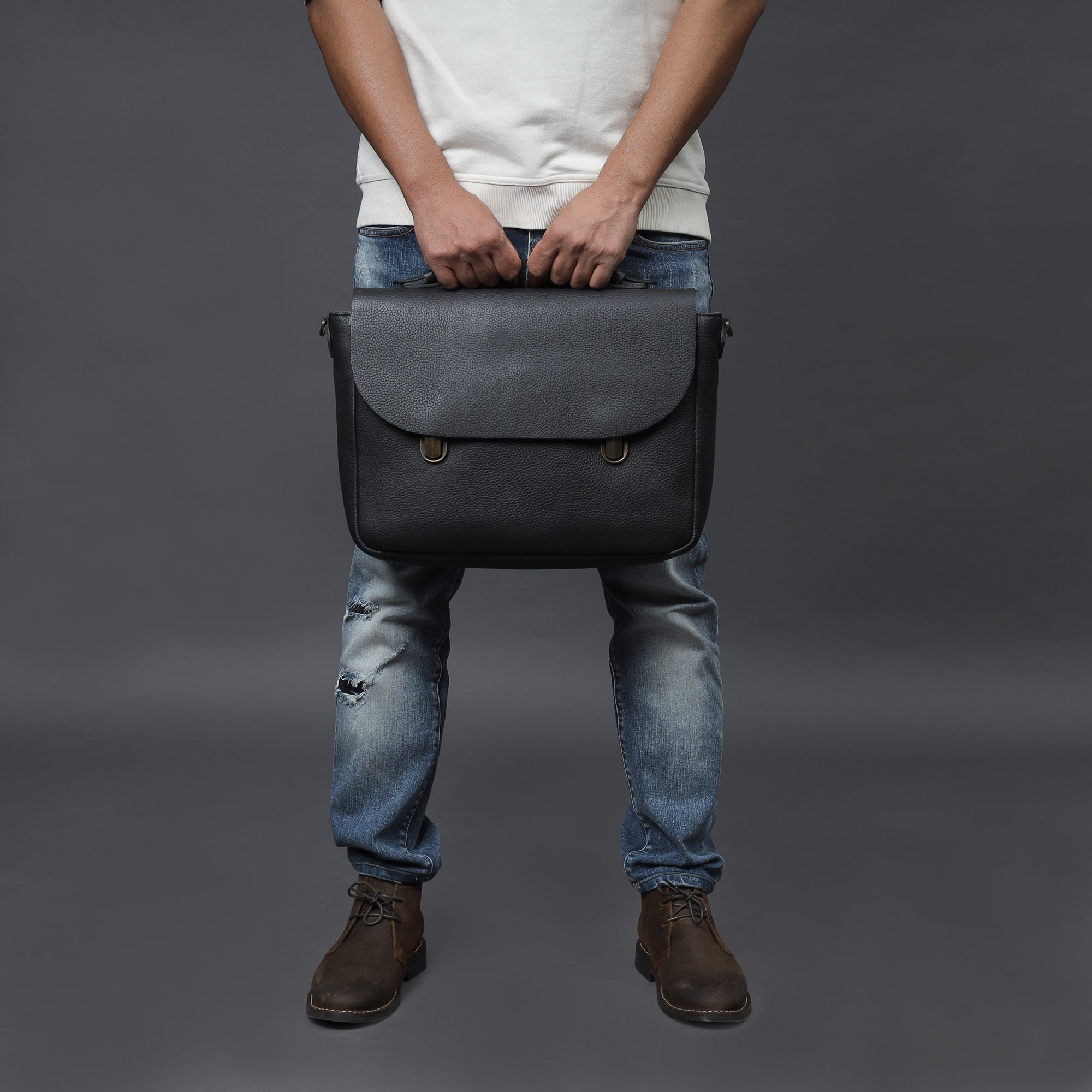 London Leather Briefcase showcasing premium full grain leather, spacious compartments, and a comfortable shoulder strap.