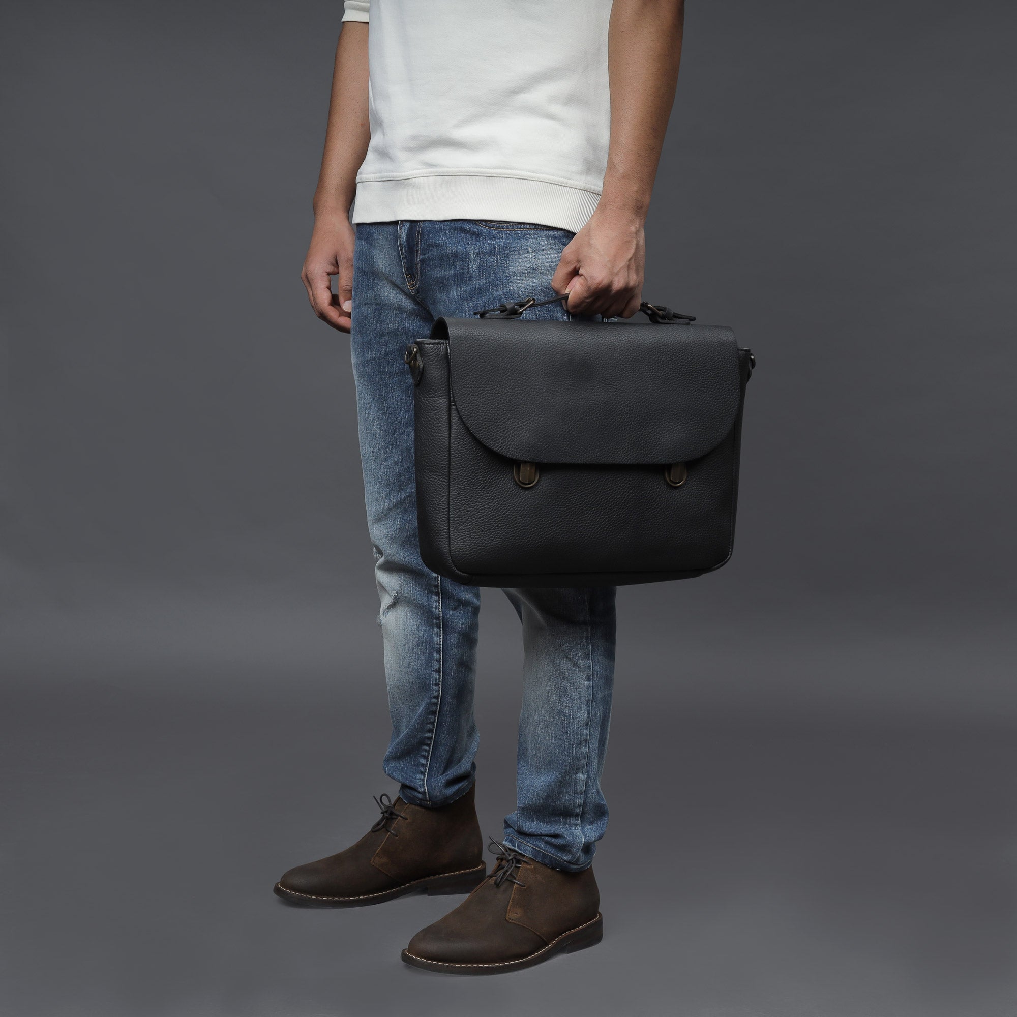 London Leather Briefcase showcasing premium full grain leather, spacious compartments, and a comfortable shoulder strap.