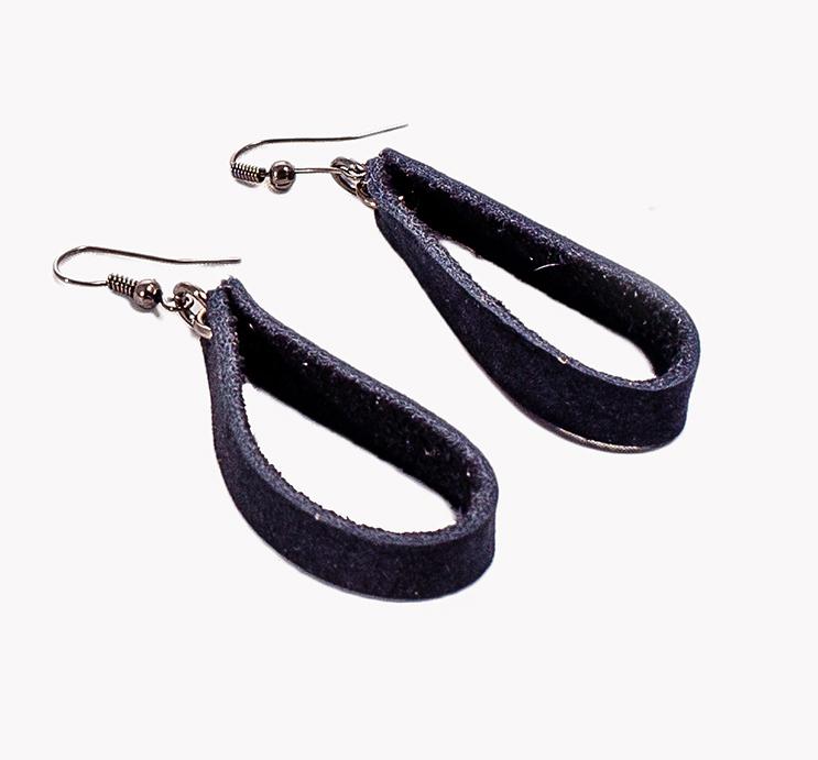 Elegant Loop Earrings made from upcycled suede scraps, showcasing a soft and lightweight design.