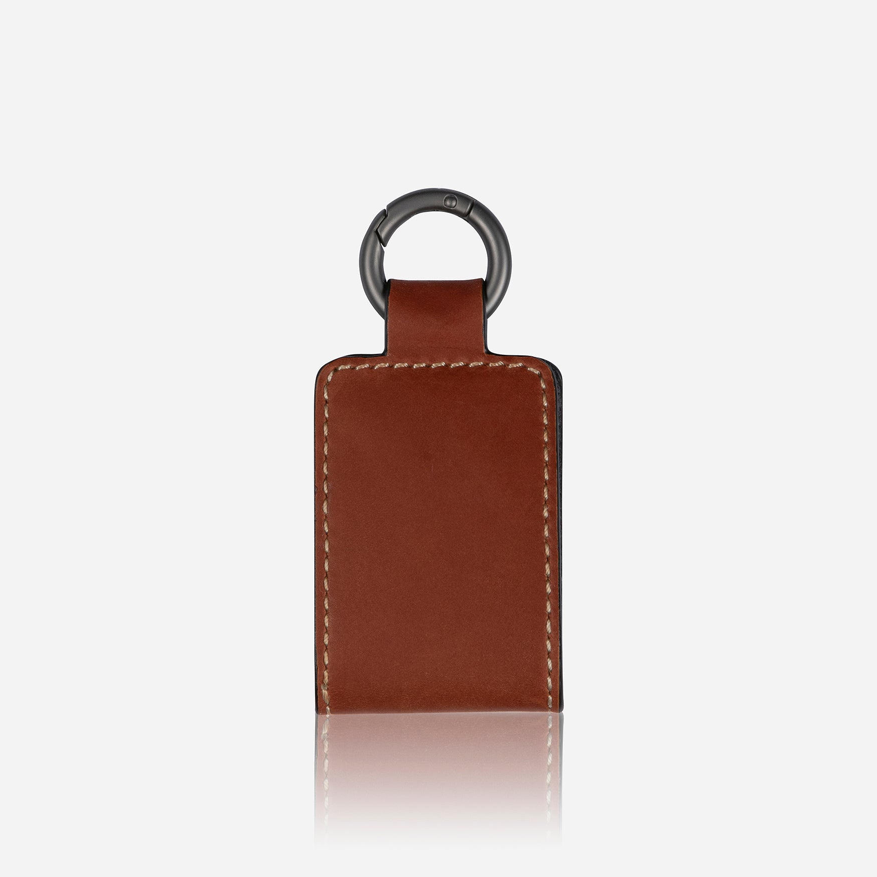 Clay leather luggage tag with push ring and press stud closure, ideal for easy bag identification.