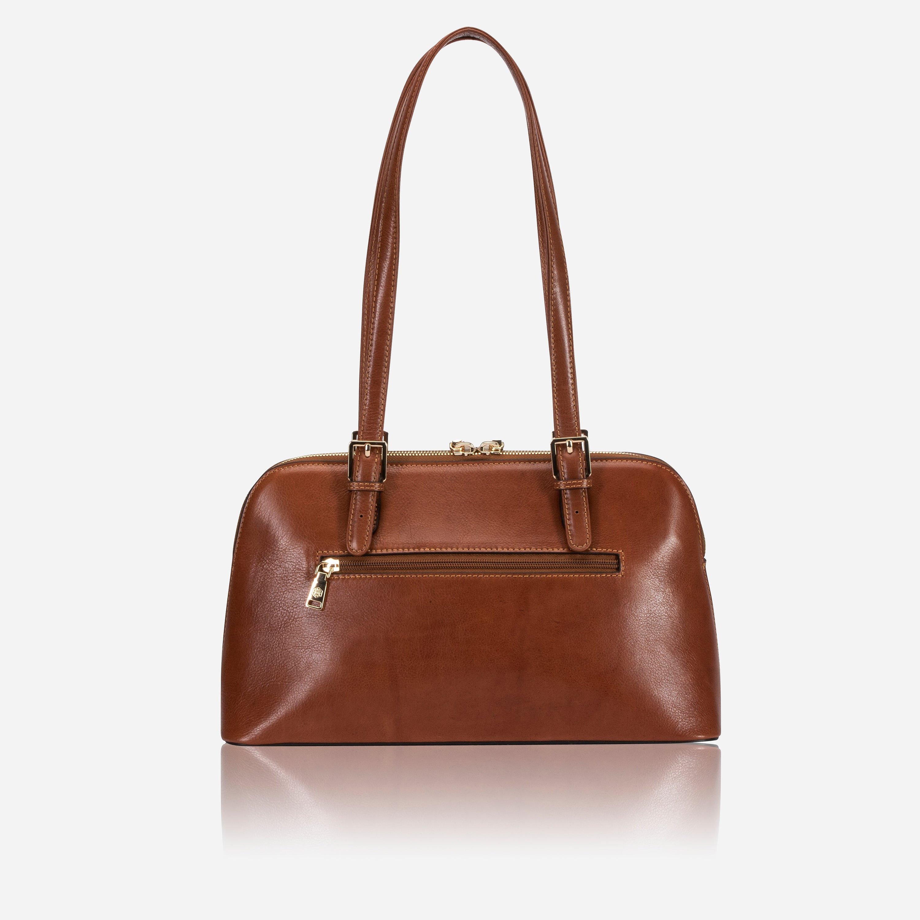 Madrid Handbag in Tan with adjustable straps and multiple pockets, showcasing its elegant design and ample space.