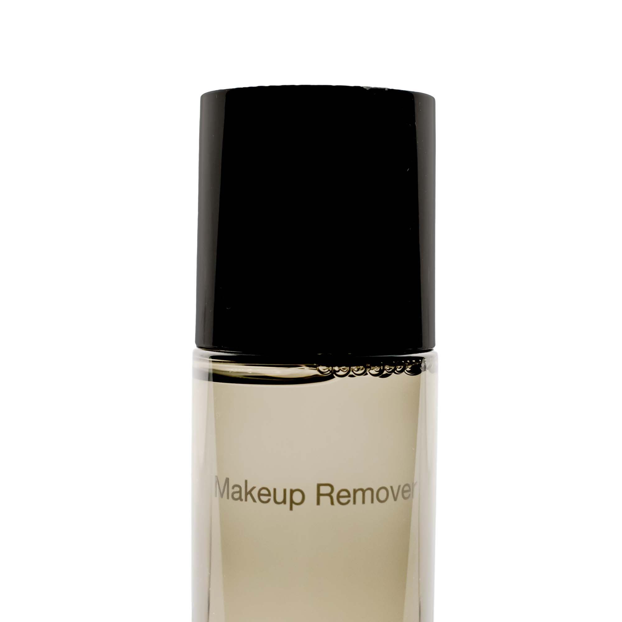 A bottle of Makeup Remover Solution with a fresh, water-based formula, designed for gentle makeup removal.