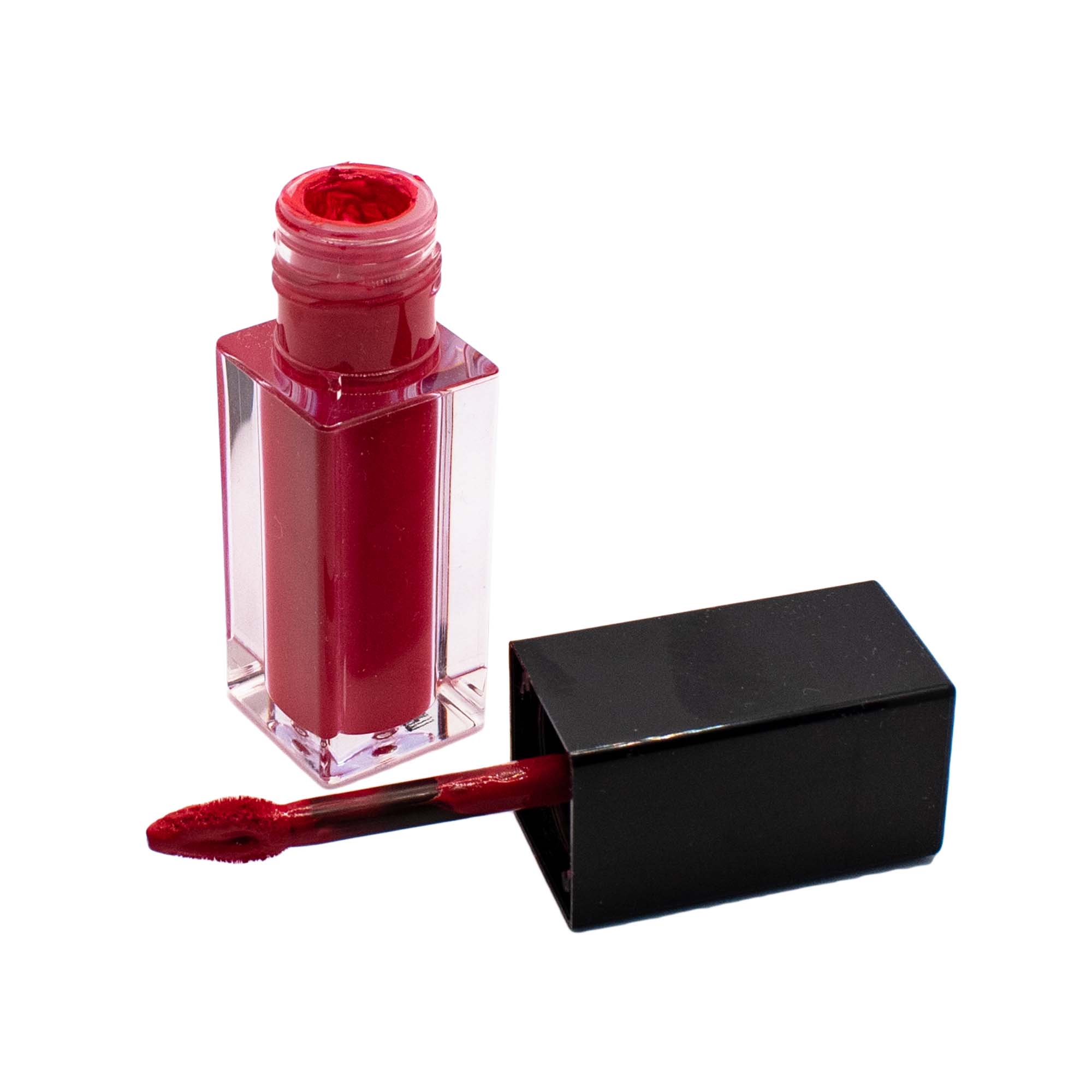 A tube of Matte Lip Stain in Blackberry Wine, showcasing its sleek design and rich, dark berry color.