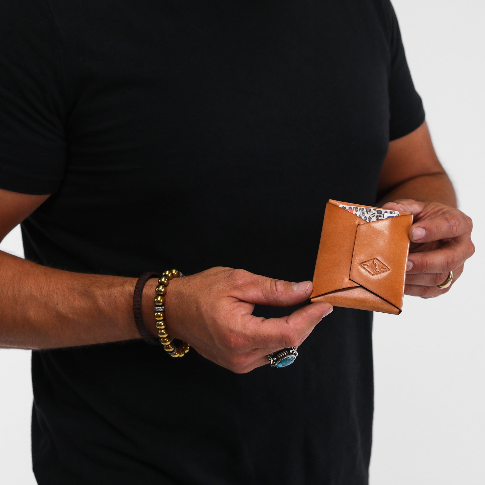 Maverick Leather Wallet made of genuine full grain leather, featuring personalized initials and a sleek design.