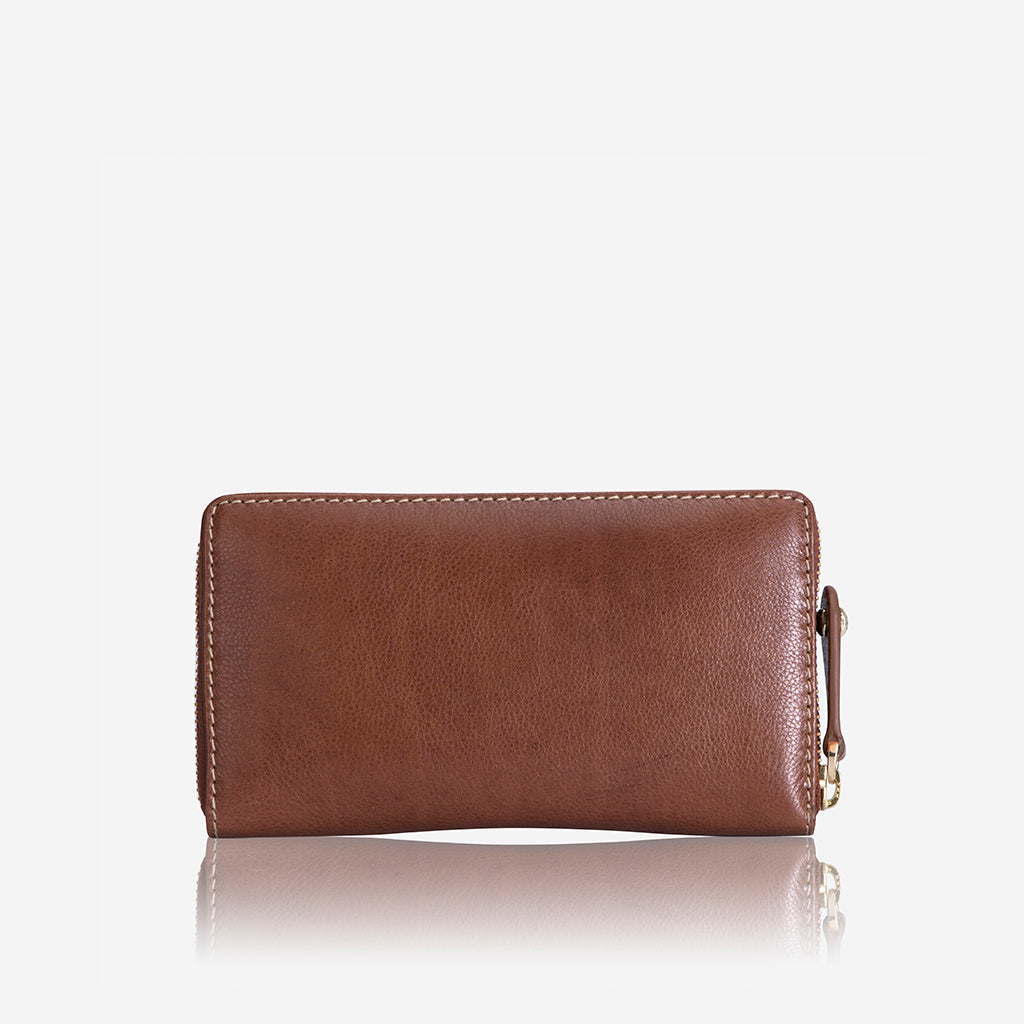 Medium Zip Around Purse in Tan featuring exclusive Italian prints, showcasing its compact and stylish design.