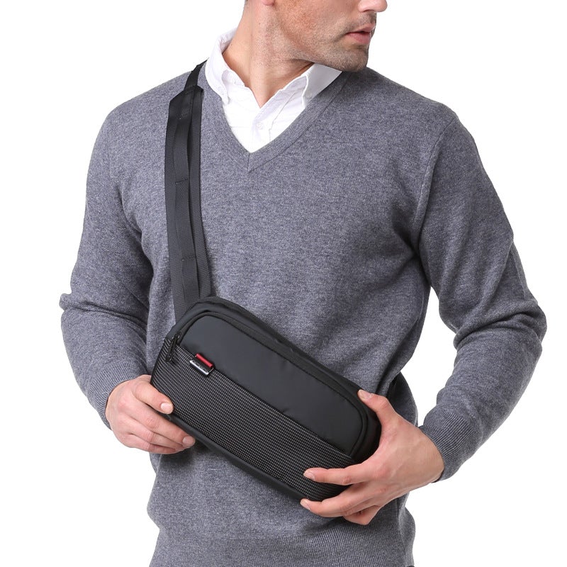 Men's Black Multipurpose Chest Bag made of nylon with multiple pockets and zipper closure, designed for style and functionality.