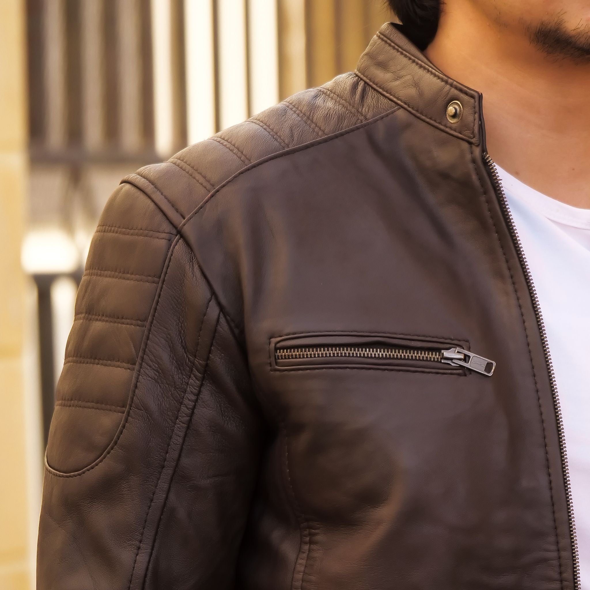 Mens Brown Lambskin Biker Style Leather Jacket featuring a front zip fastener and snap button collar, made from 100% real lambskin leather.