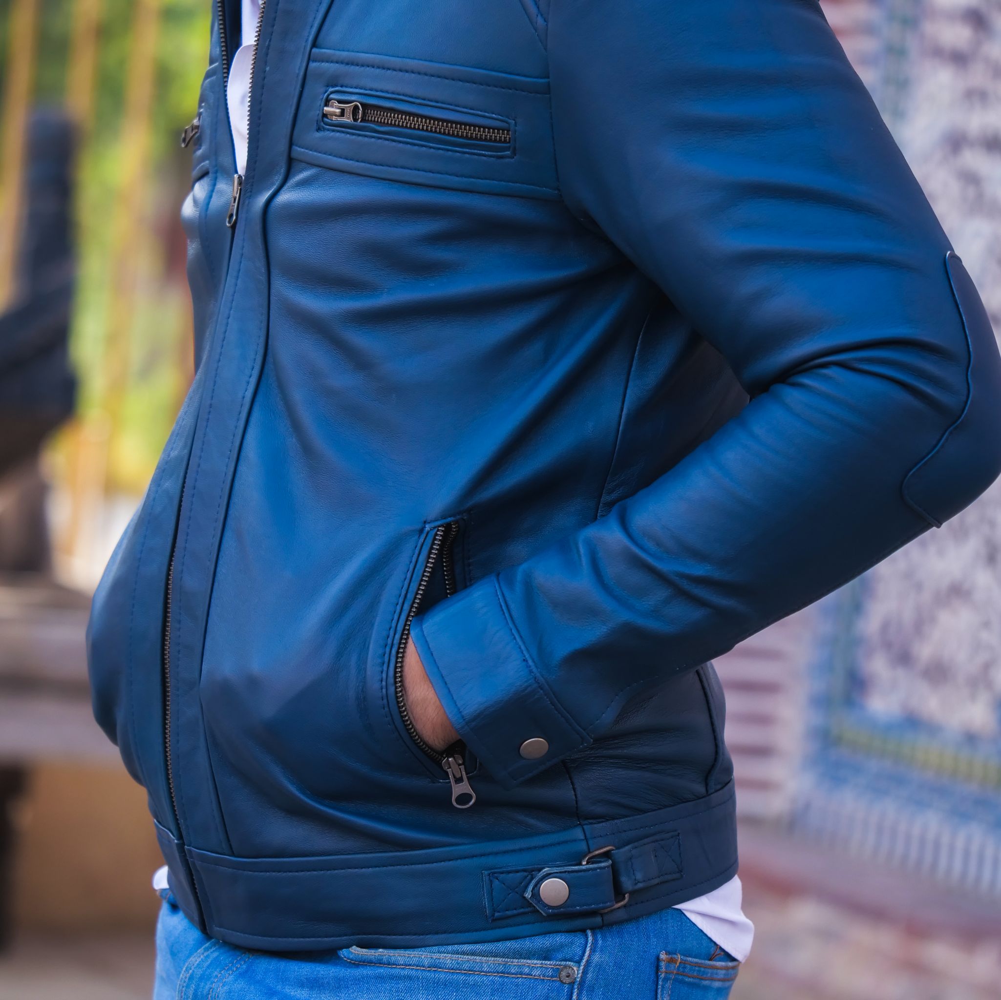 Men's Casual Signature Diamond Lambskin Leather Jacket in Blue, featuring a quilted diamond pattern and multiple zip pockets.