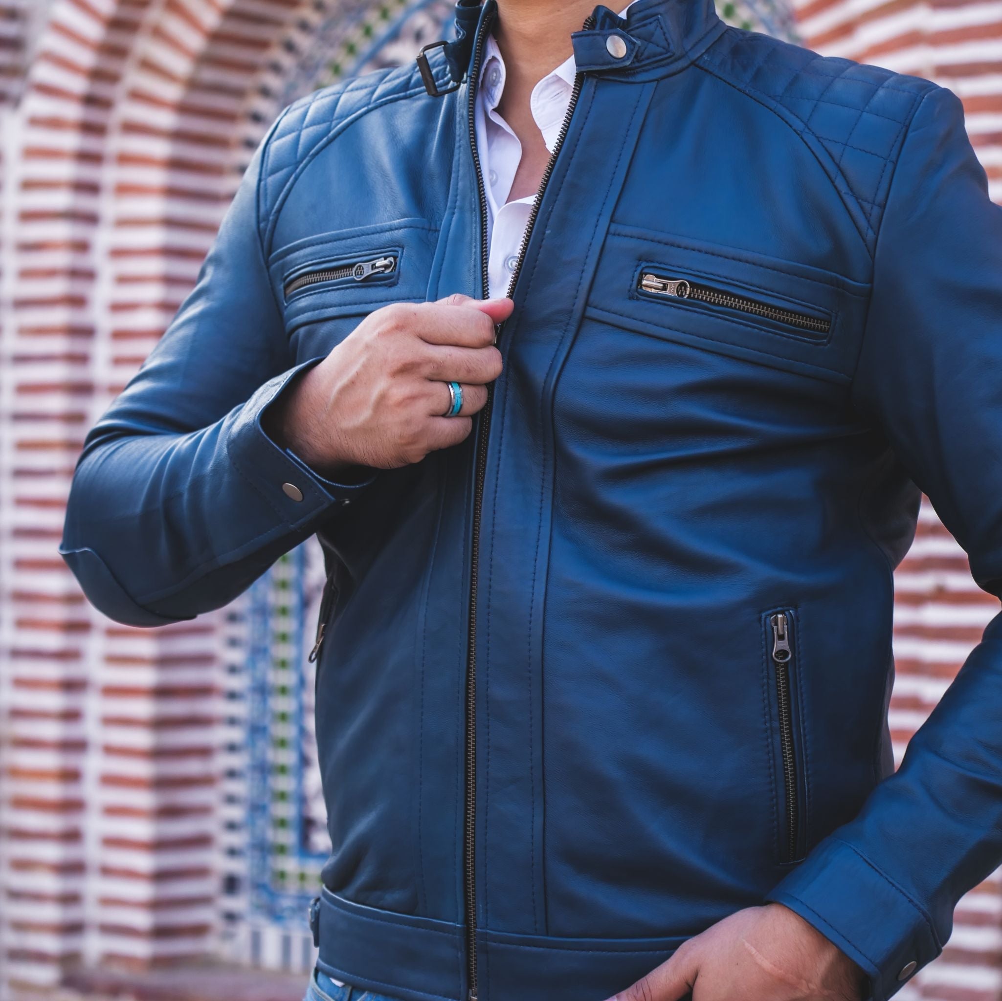 Men's Casual Signature Diamond Lambskin Leather Jacket in Blue, featuring a quilted diamond pattern and multiple zip pockets.