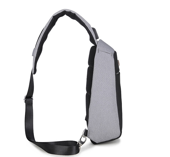 Men's Casual USB Charging Fashion Crossbody Bag in solid color, made of waterproof nylon with a zipper closure.