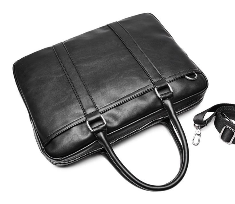 Men's High Quality Leather Portable Briefcase in black, featuring a soft leather surface, zipper opening, and stylish car suture detailing.