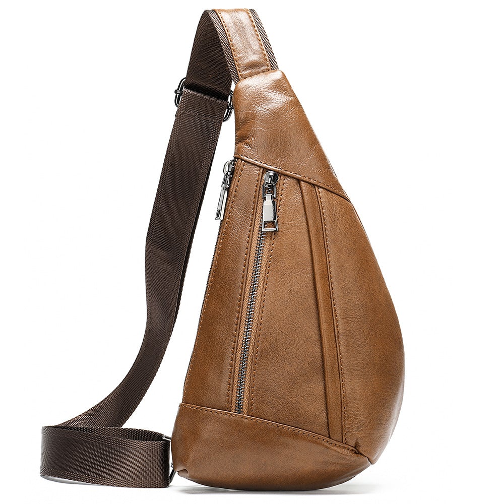 Men's leather crossbody bag in triangle shape, featuring a zipper closure and soft surface, ideal for casual outings.