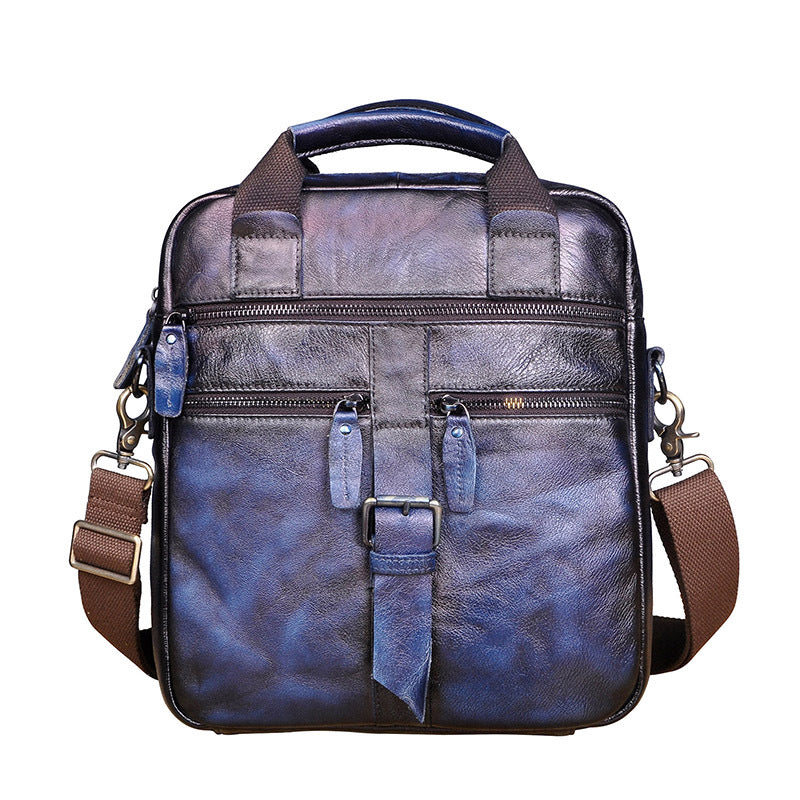 Men's Leather Retro Messenger Bag in cowhide leather, featuring a square vertical design with a magnetic buckle and soft handle.