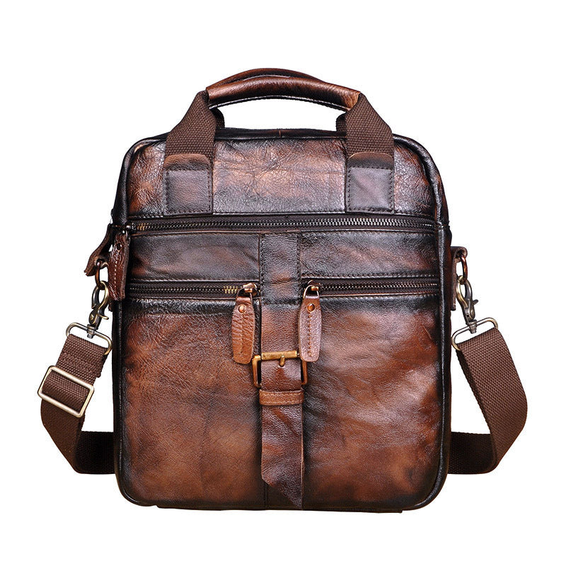 Men's Leather Retro Messenger Bag in cowhide leather, featuring a square vertical design with a magnetic buckle and soft handle.