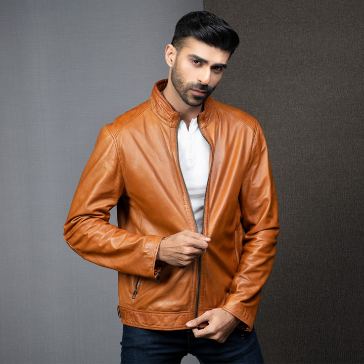 Brown men's premium leather jacket made from 100% real sheep leather, featuring a front zip fastener and snap button collar.