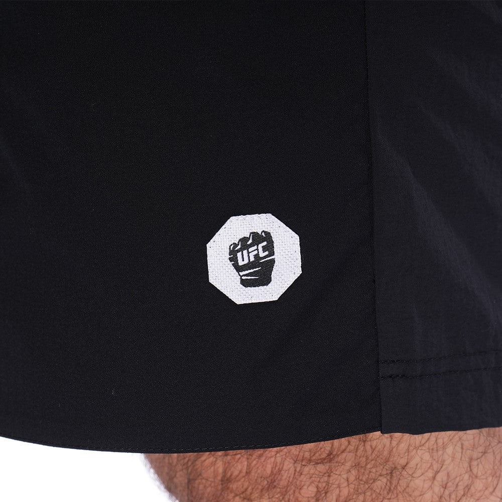 Men's UFC Fist Short in Black featuring alternate logo and two back pockets, perfect for training and casual wear.