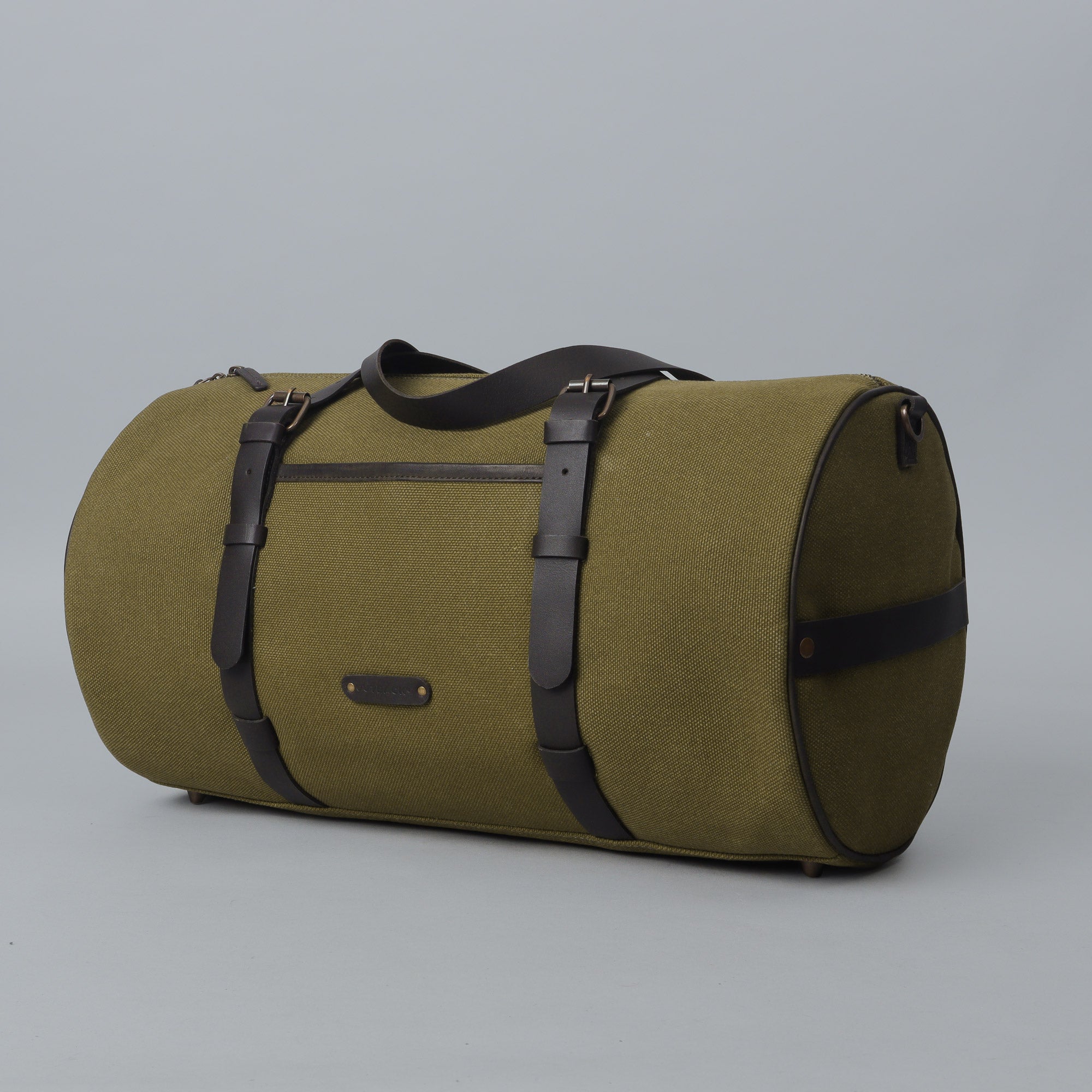 Miami Canvas Gym Bag showcasing its durable cotton canvas material, leather straps, and spacious design, perfect for gym and travel.