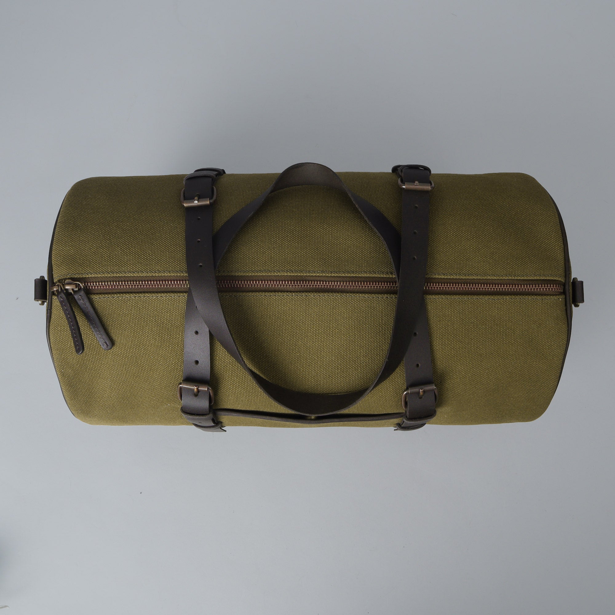 Miami Canvas Gym Bag showcasing its durable cotton canvas material, leather straps, and spacious design, perfect for gym and travel.