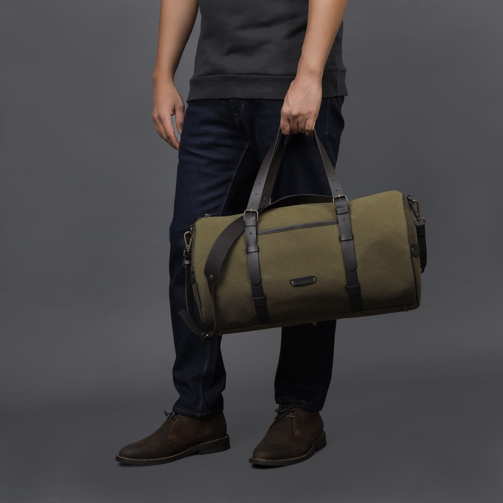 Miami Canvas Gym Bag showcasing its durable cotton canvas material, leather straps, and spacious design, perfect for gym and travel.