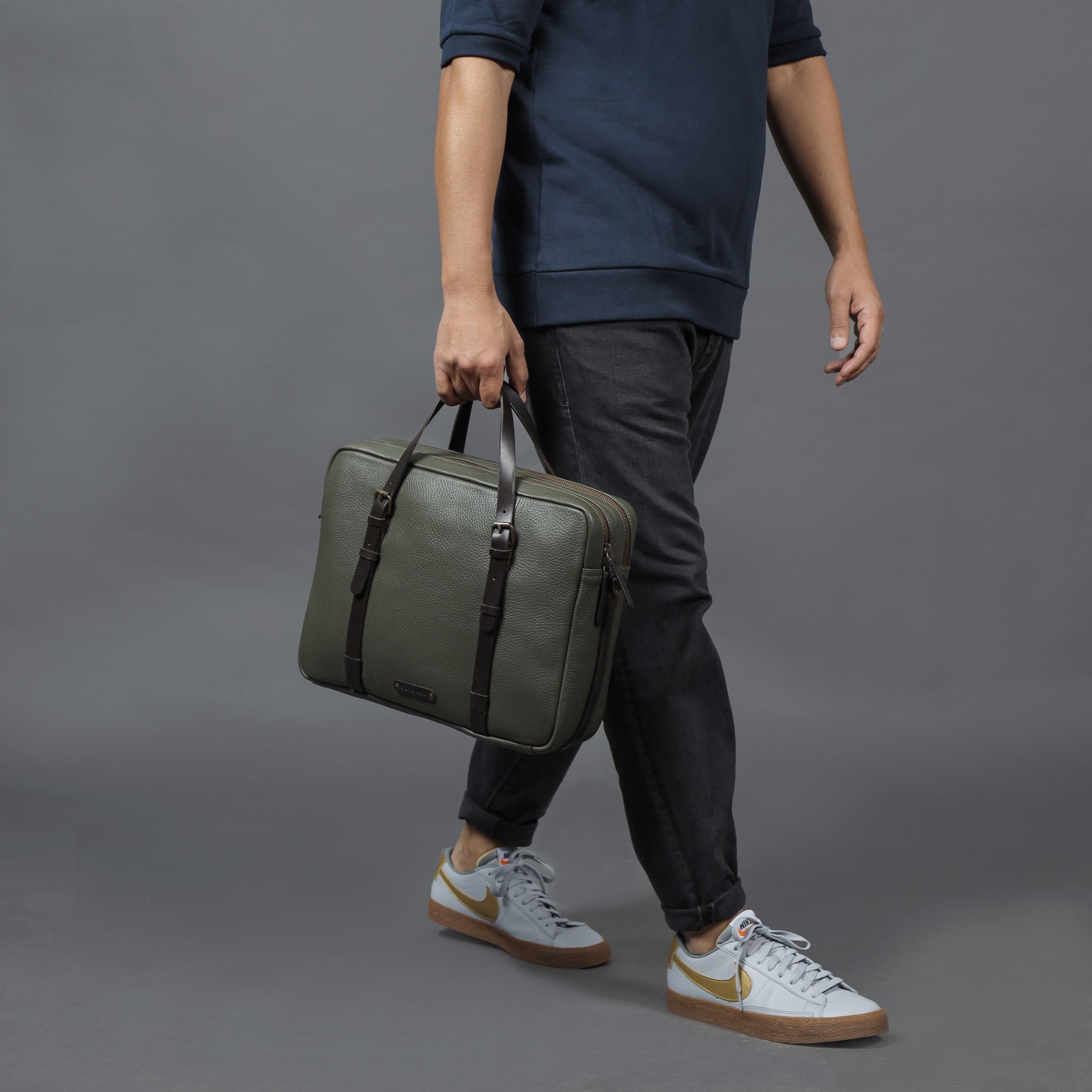 Miami Leather Briefcase showcasing premium full grain leather, spacious compartments, and adjustable shoulder strap, perfect for professionals.