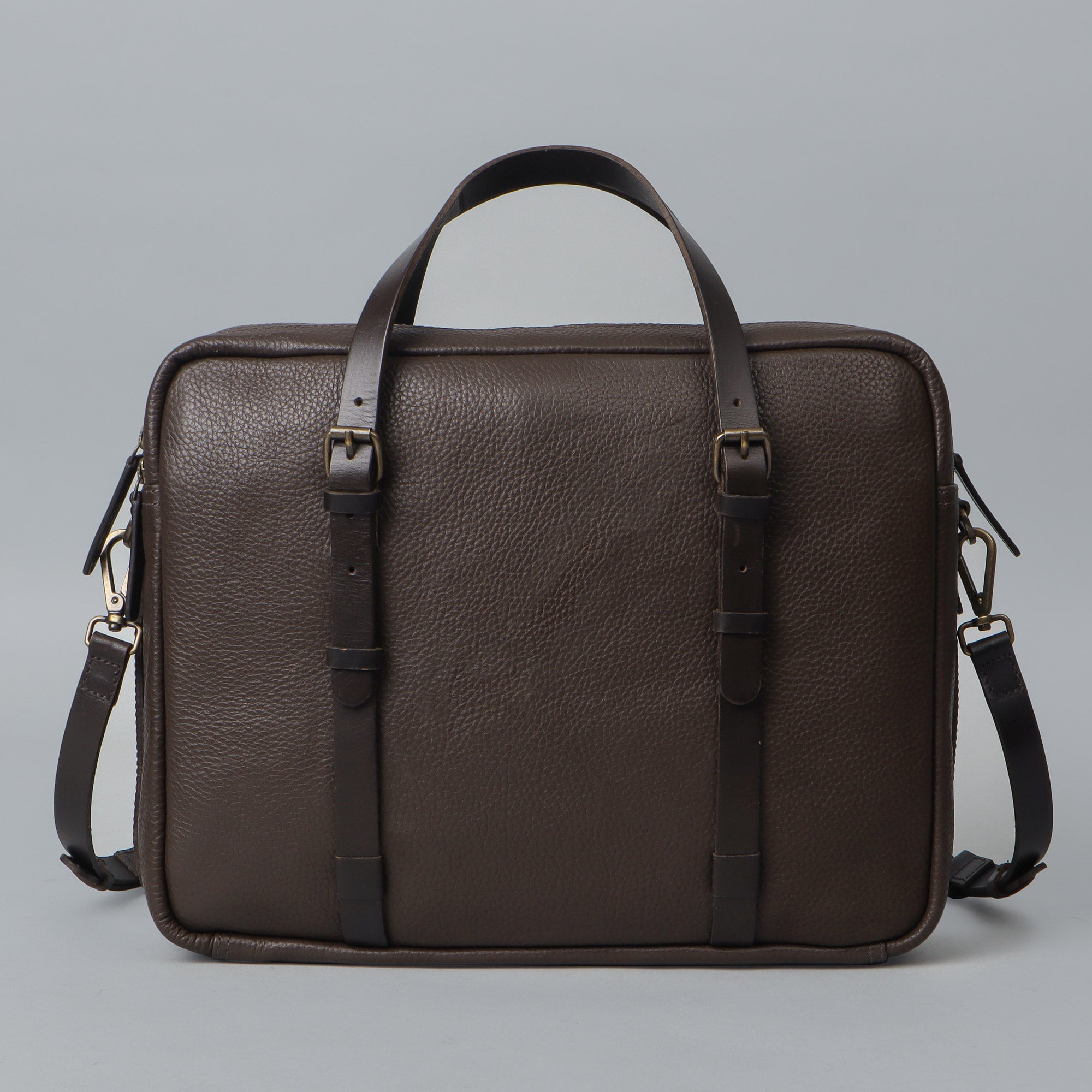 Miami Leather Briefcase showcasing premium full grain leather, spacious compartments, and adjustable shoulder strap.