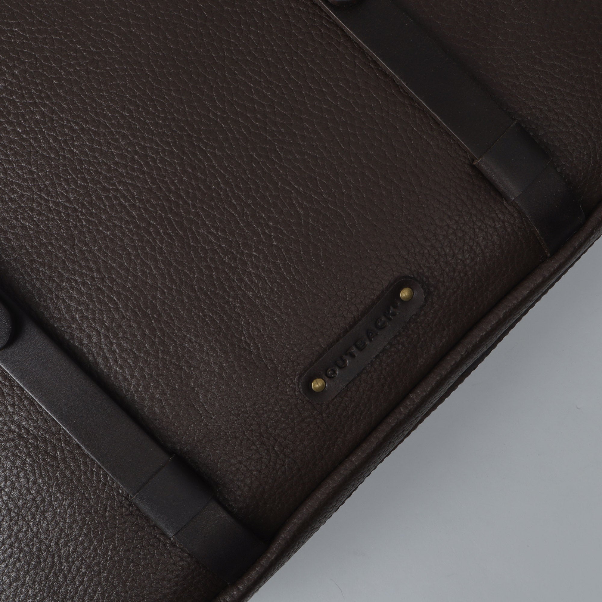 Miami Leather Briefcase showcasing premium full grain leather, spacious compartments, and adjustable shoulder strap.