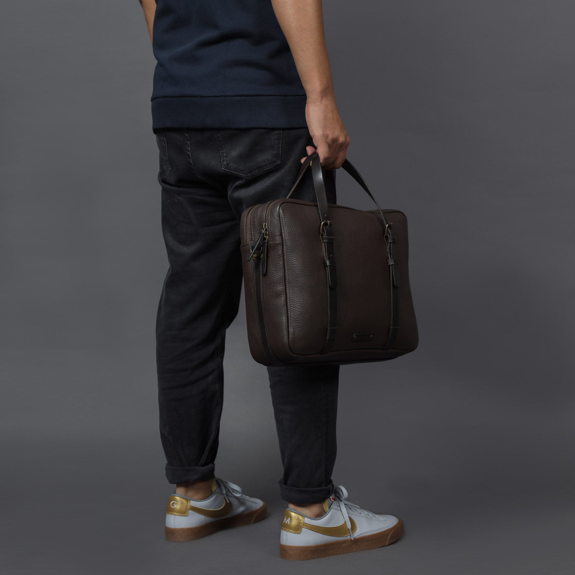 Miami Leather Briefcase showcasing premium full grain leather, spacious compartments, and adjustable shoulder strap.