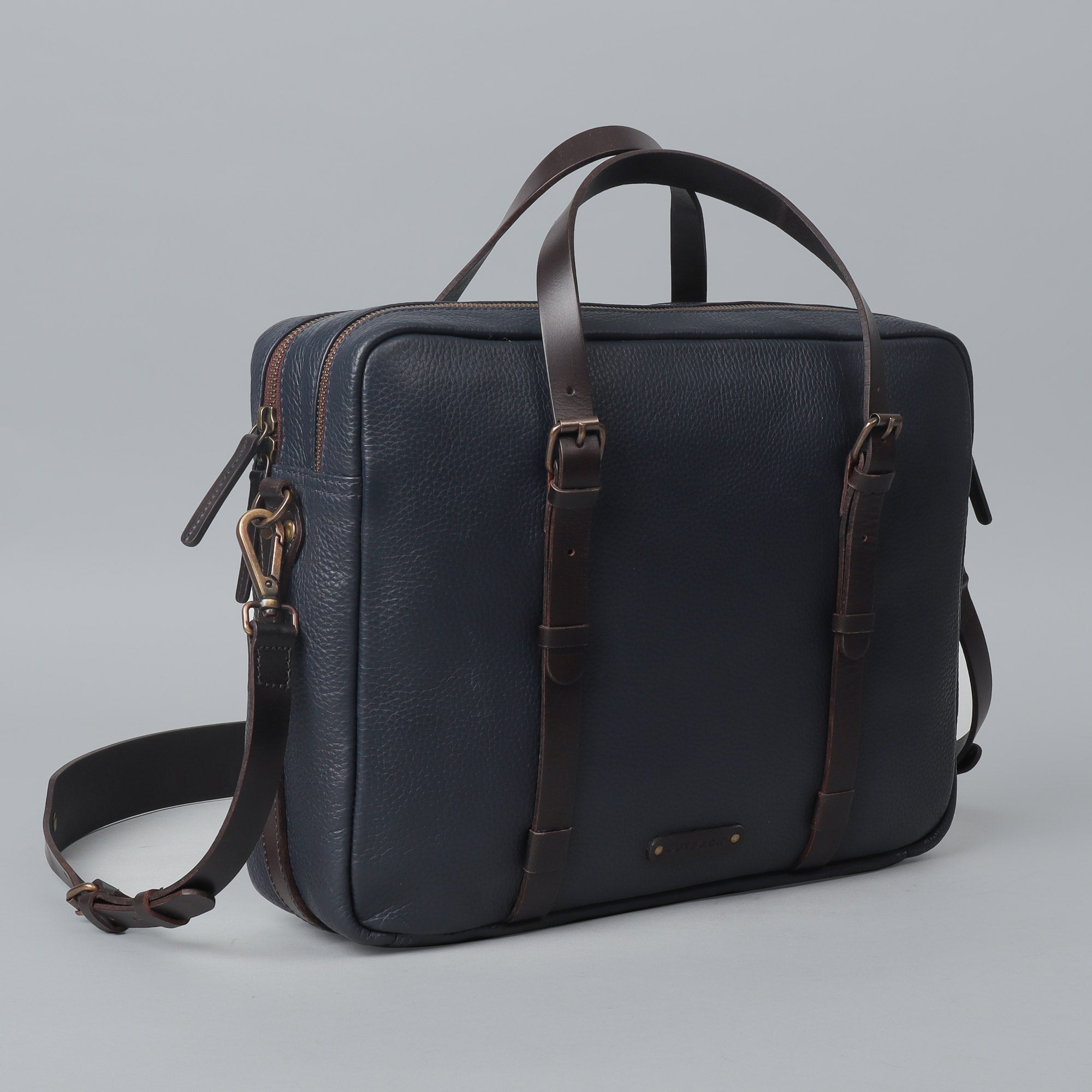 Miami Leather Briefcase showcasing premium full grain leather, spacious compartments, and adjustable shoulder strap, perfect for professionals.