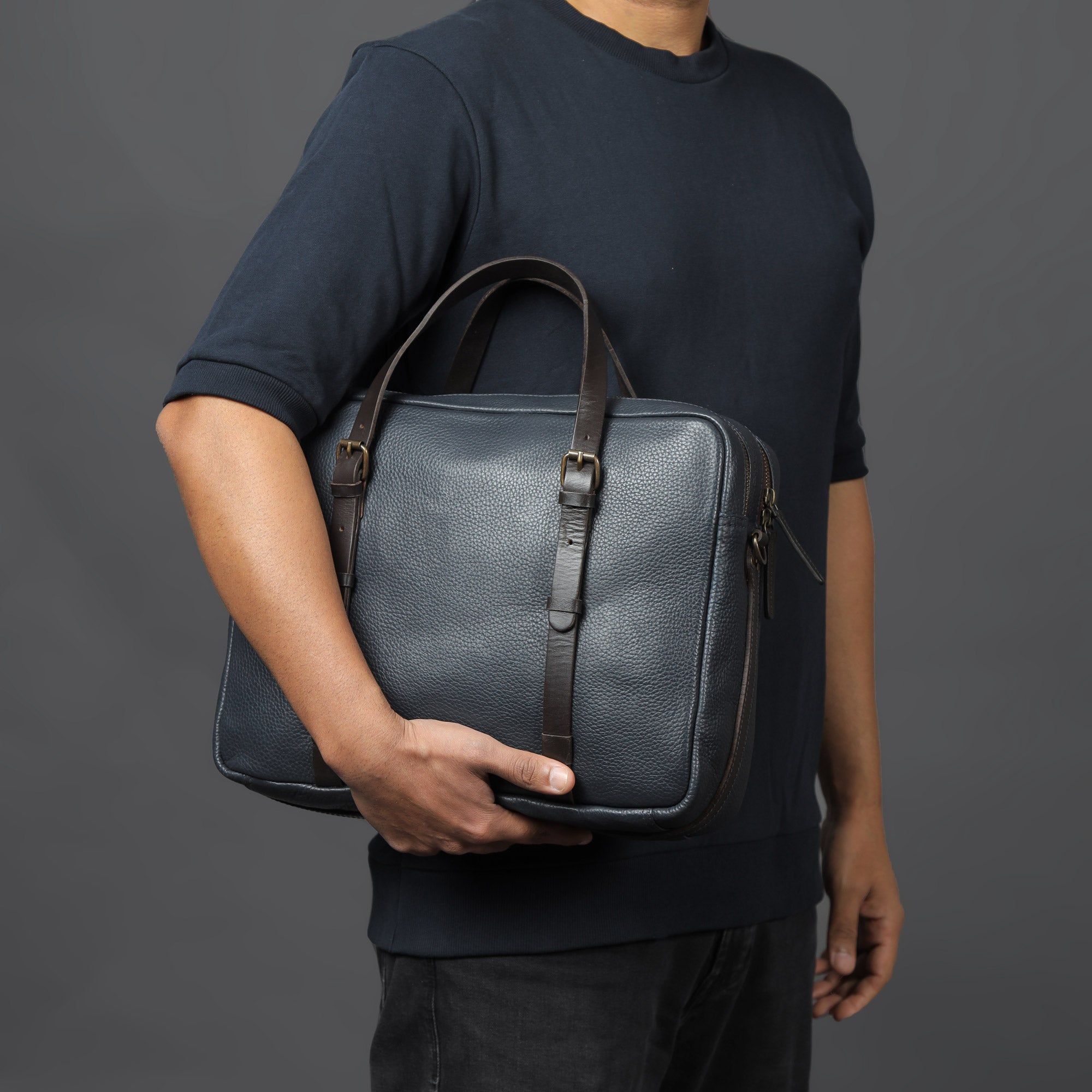 Miami Leather Briefcase showcasing premium full grain leather, spacious compartments, and adjustable shoulder strap, perfect for professionals.