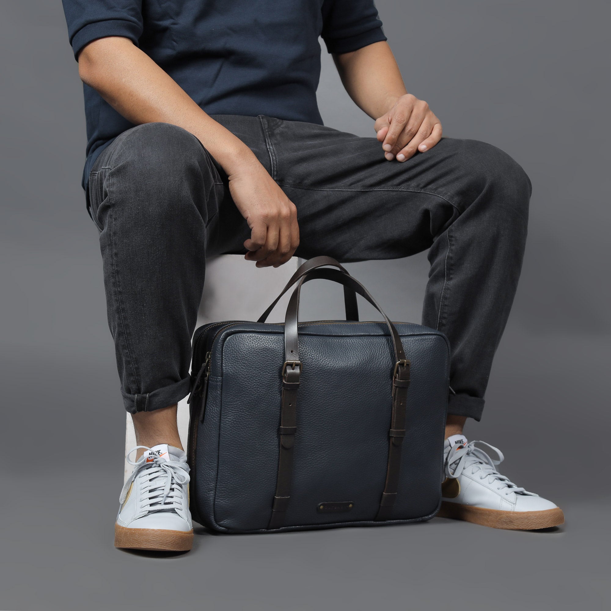 Miami Leather Briefcase showcasing premium full grain leather, spacious compartments, and adjustable shoulder strap, perfect for professionals.