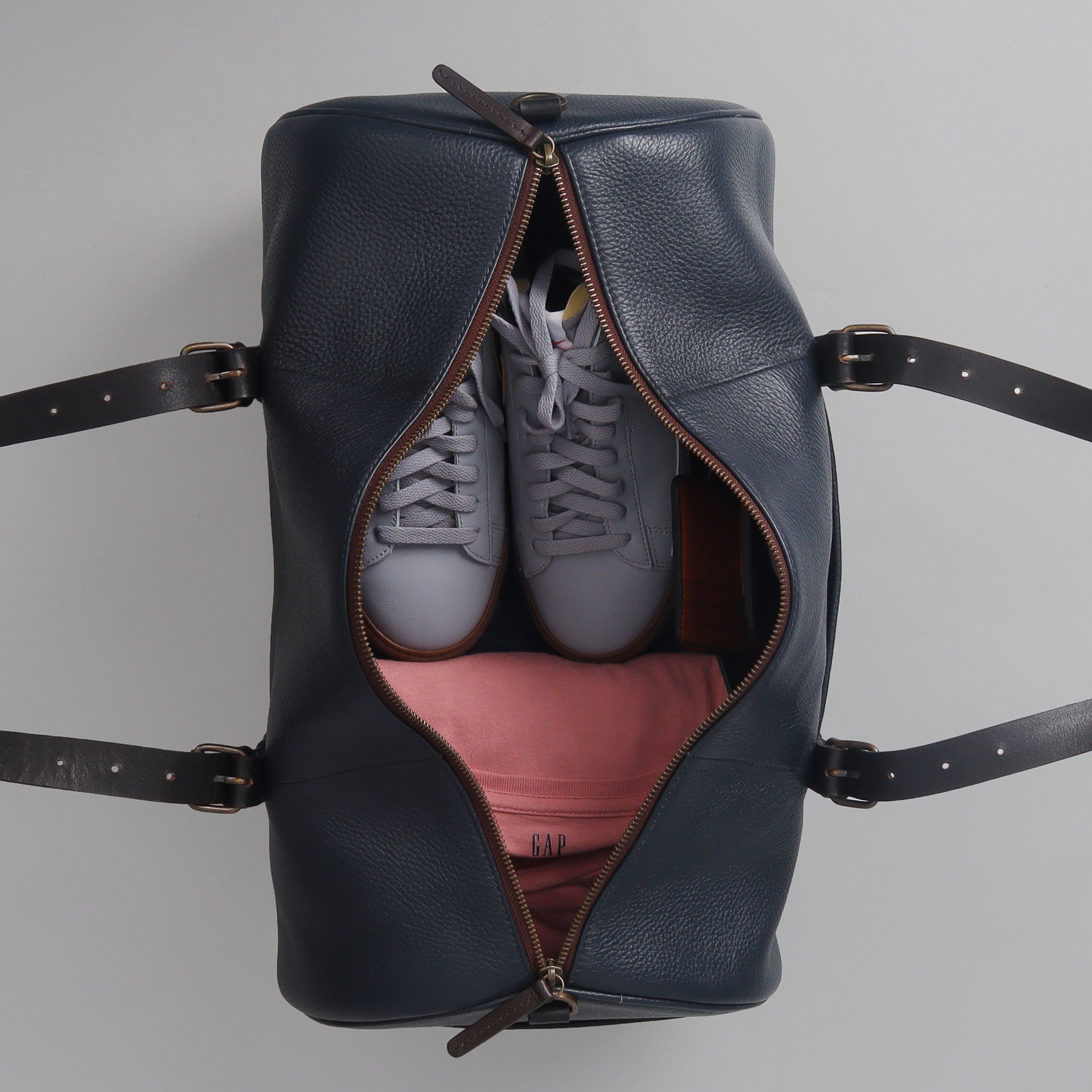 Miami Leather Gym Bag showcasing premium full grain leather, spacious compartments, and antique brass hardware.