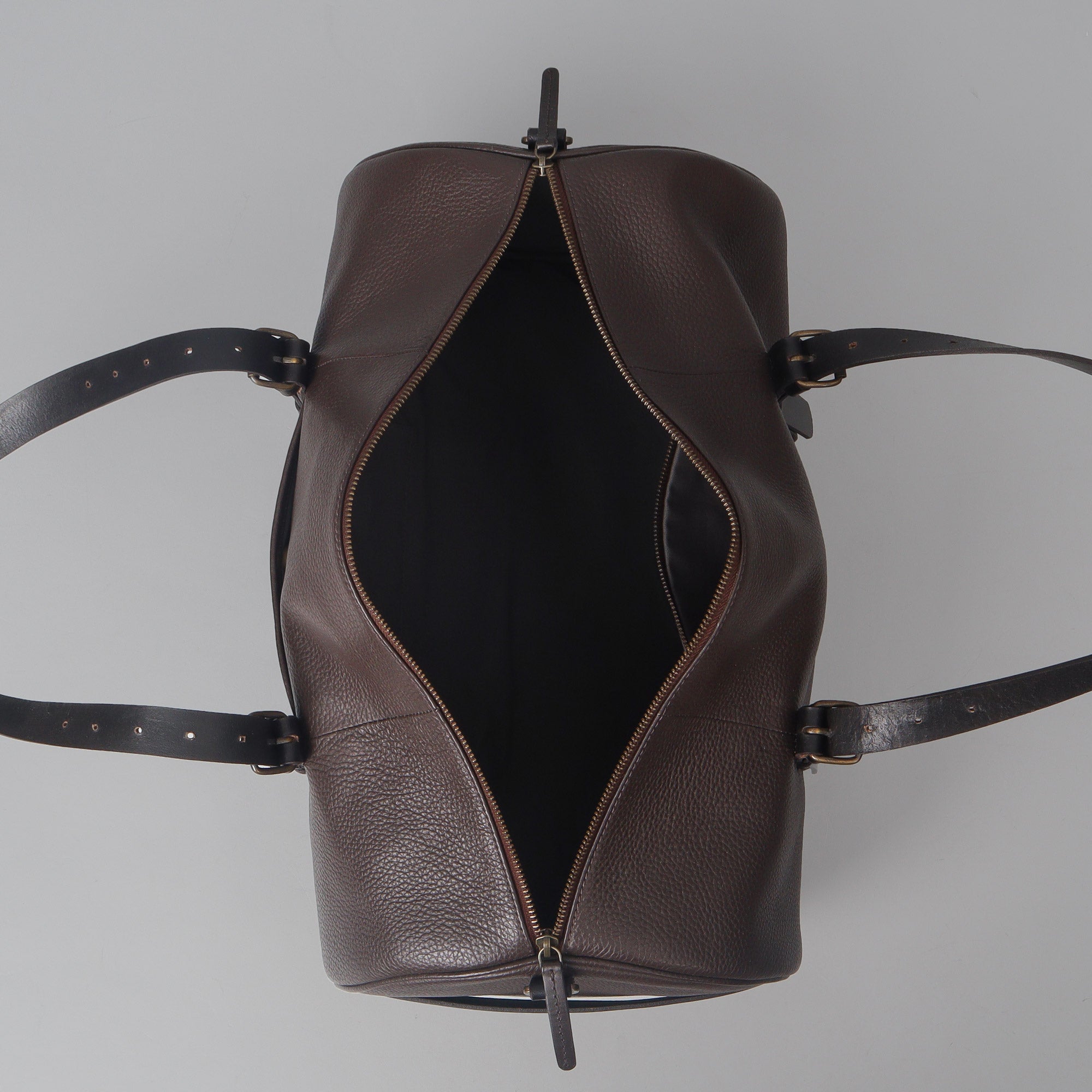 Miami Leather Gym Bag showcasing premium full grain leather, spacious design, and antique brass hardware.