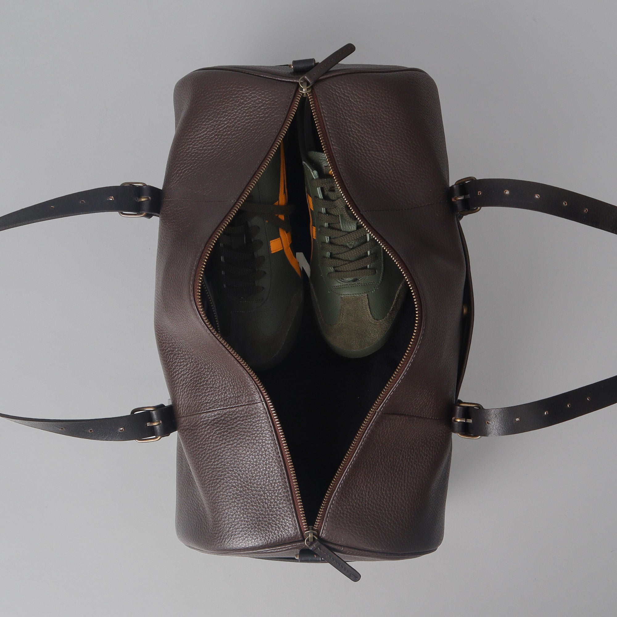 Miami Leather Gym Bag showcasing premium full grain leather, spacious design, and antique brass hardware.