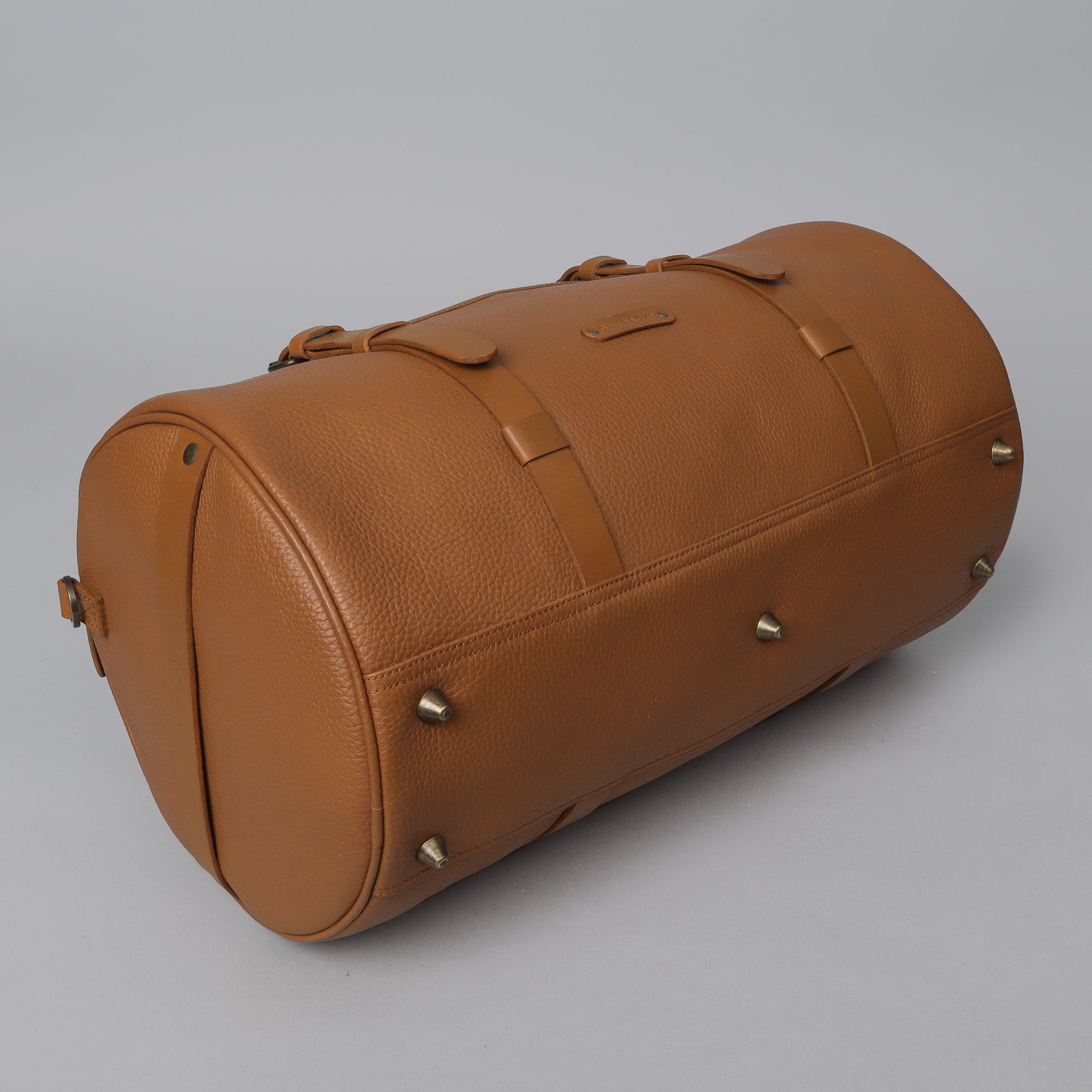 Miami Leather Gym Bag showcasing premium full grain leather, spacious compartments, and antique brass hardware.