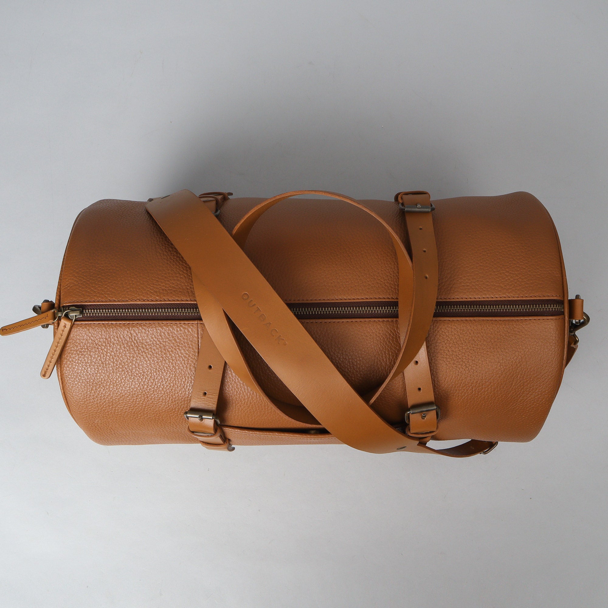 Miami Leather Gym Bag showcasing premium full grain leather, spacious compartments, and antique brass hardware.