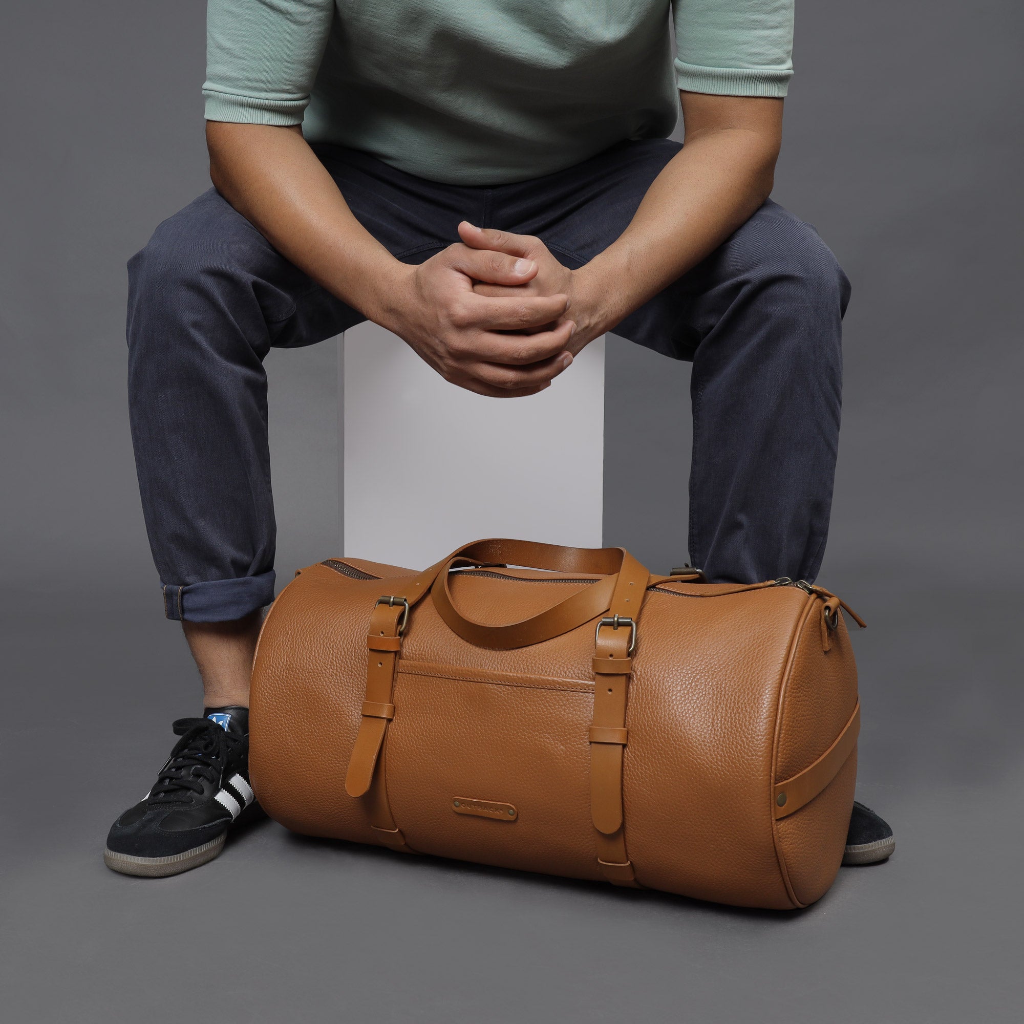 Miami Leather Gym Bag showcasing premium full grain leather, spacious compartments, and antique brass hardware.