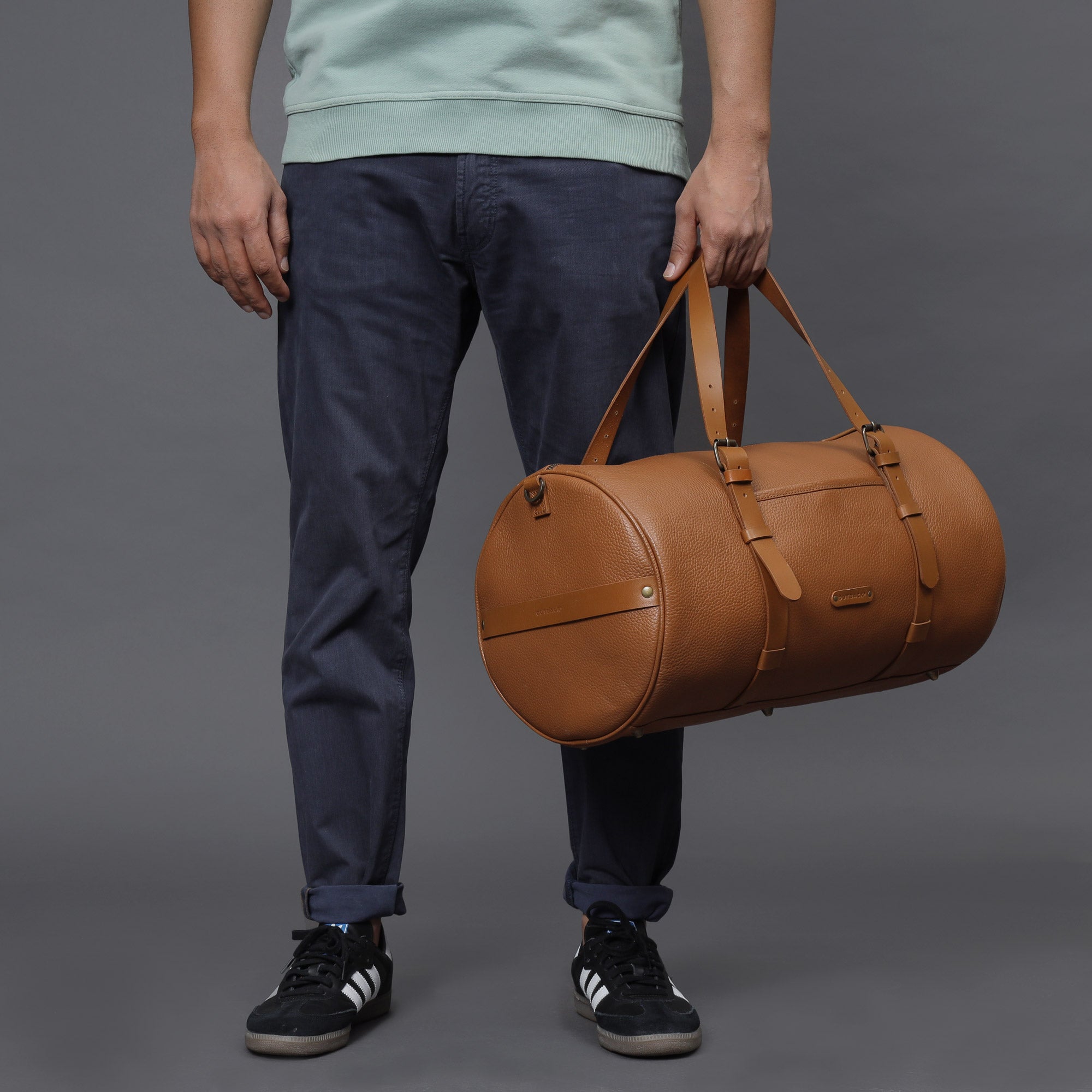 Miami Leather Gym Bag showcasing premium full grain leather, spacious compartments, and antique brass hardware.